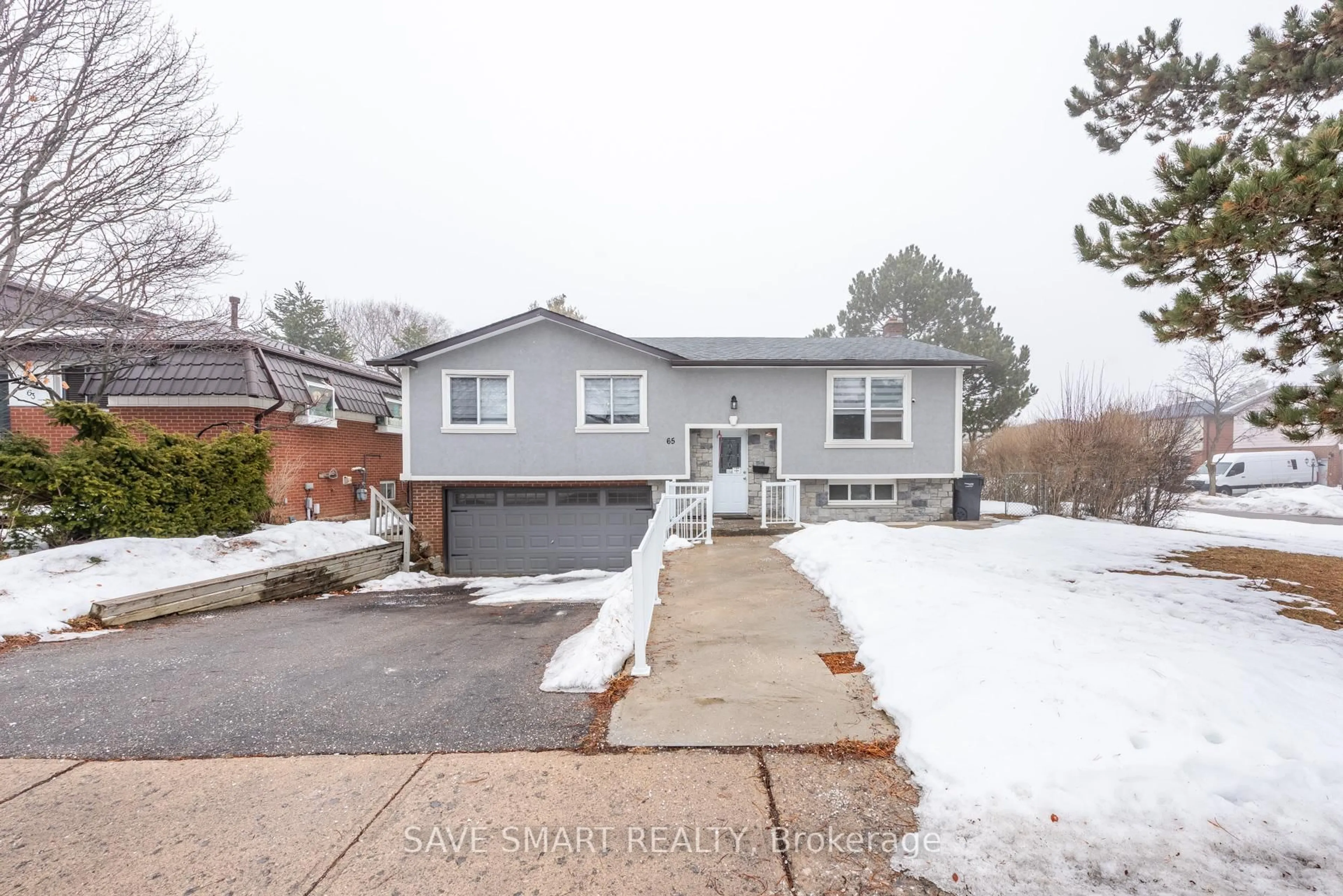 Home with brick exterior material, street for 65 Abell Dr, Brampton Ontario L6V 2W1