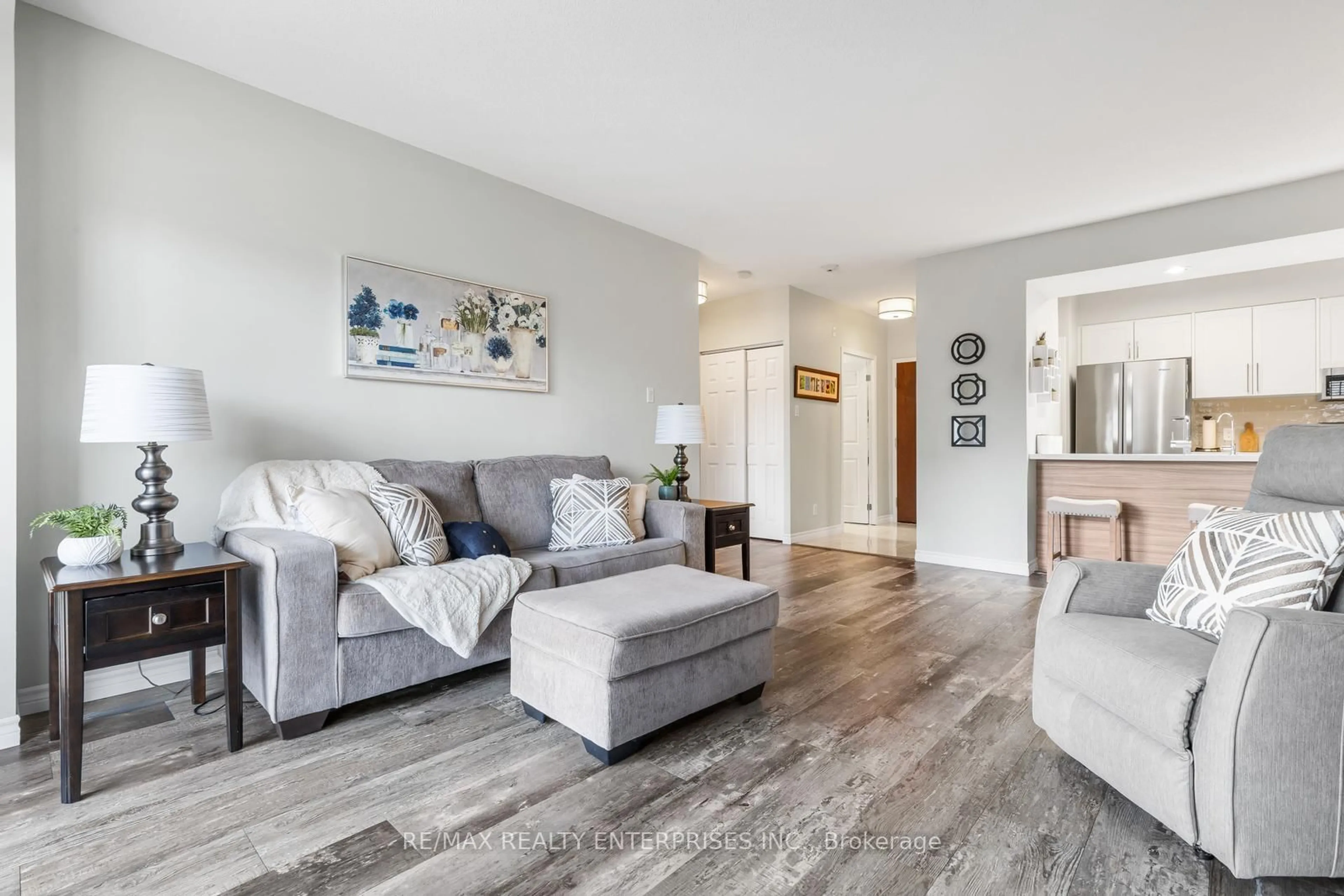 Living room with furniture, unknown for 24 Chapel St #302, Halton Hills Ontario L7G 6A7