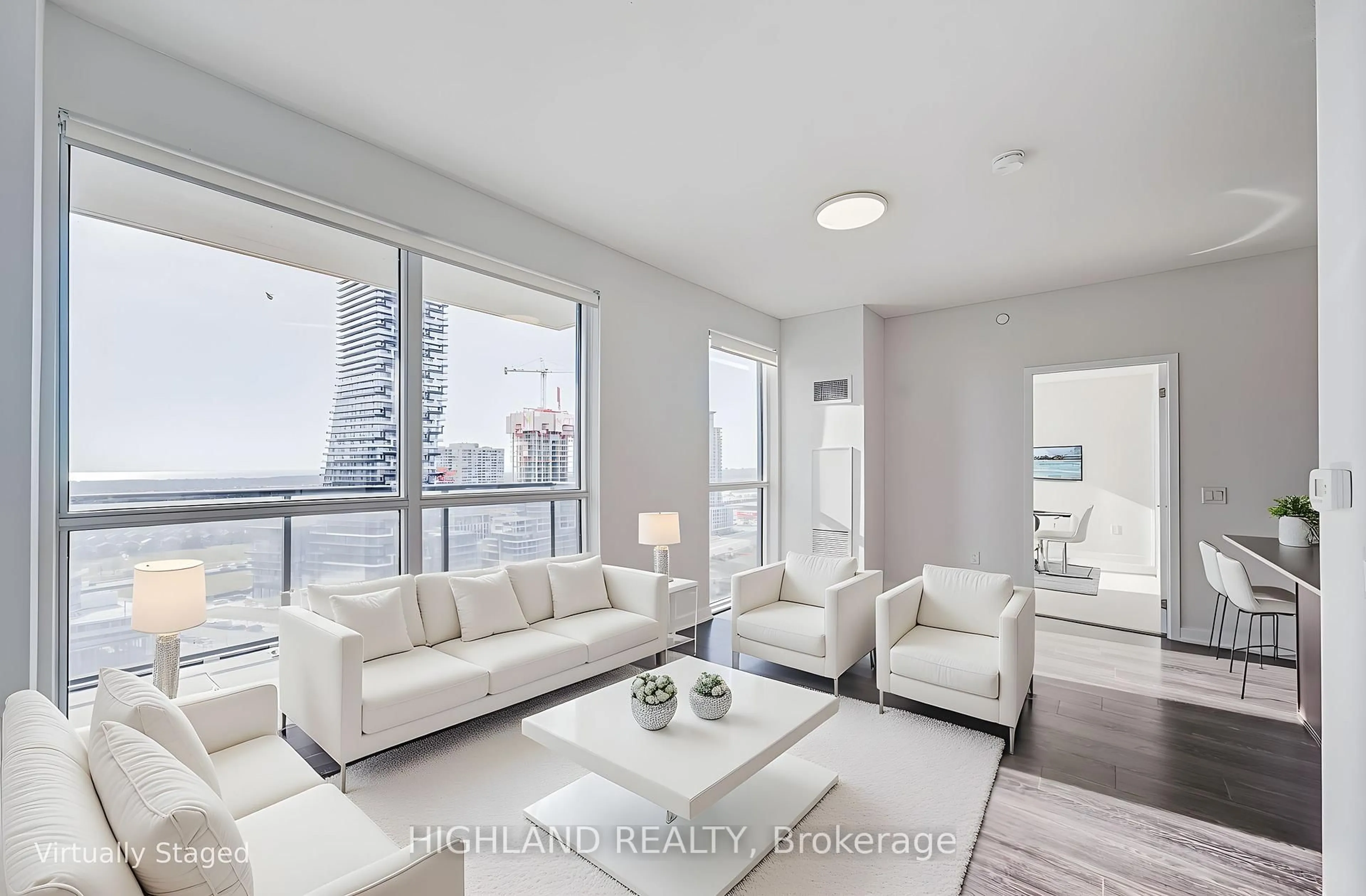 Living room with furniture, unknown for 4055 Parkside Village Dr #1918, Mississauga Ontario L5B 0K8