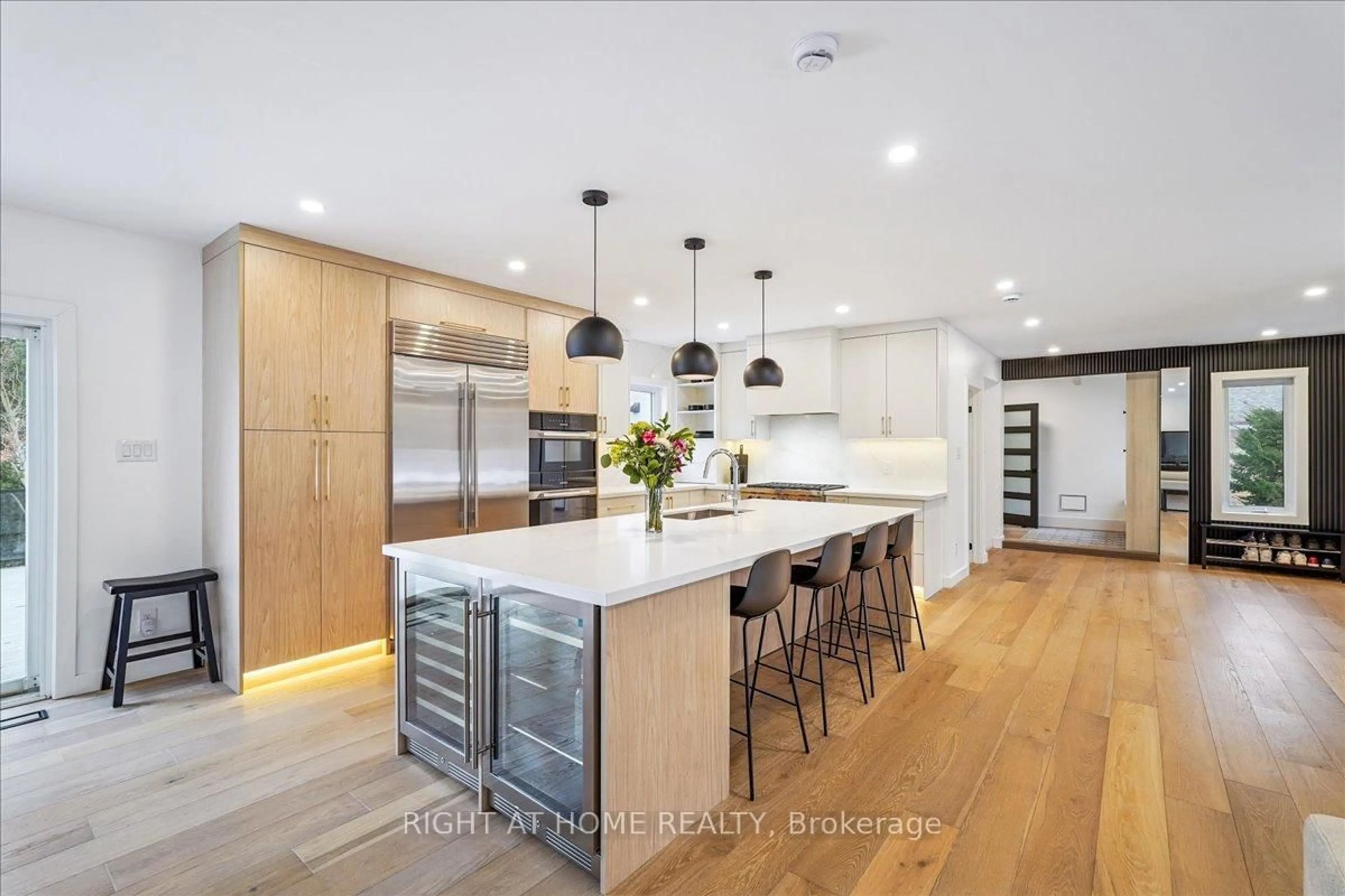 Contemporary kitchen, wood/laminate floor for 2090 Stonehouse Cres, Mississauga Ontario L5H 3J1