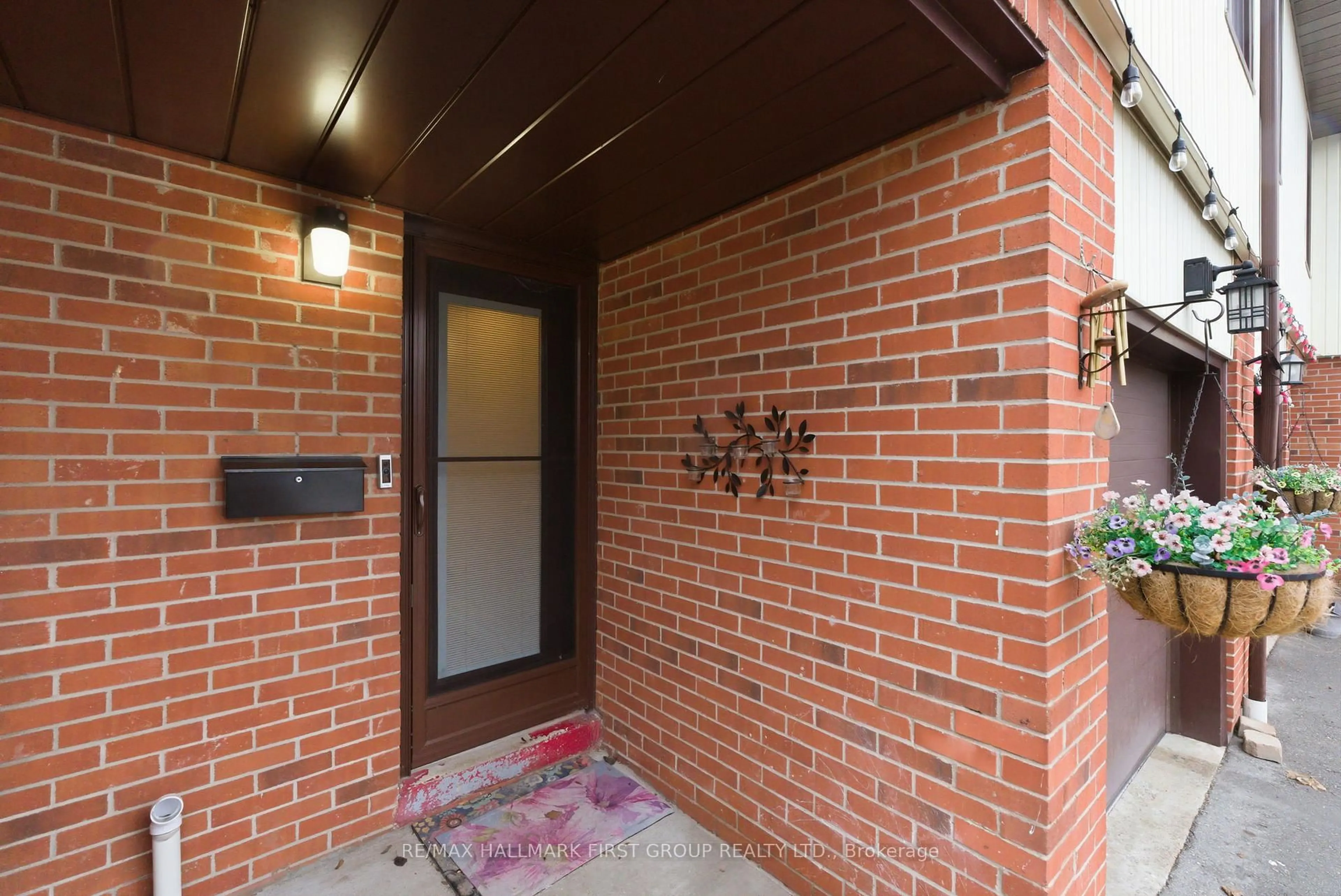 Home with brick exterior material, street for 61 Foster Cres #61, Brampton Ontario L6V 3M8