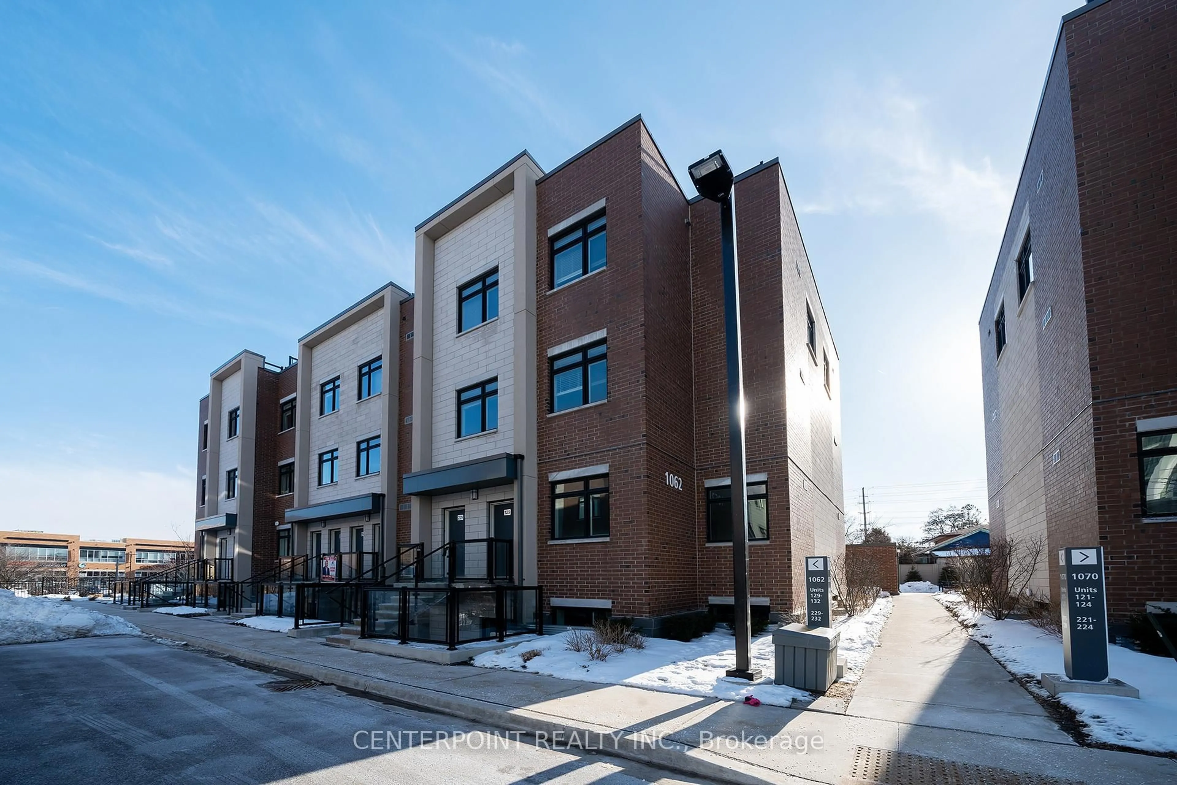 Home with brick exterior material, street for 1062 Douglas Mccurdy Common #125, Mississauga Ontario L5G 0C6