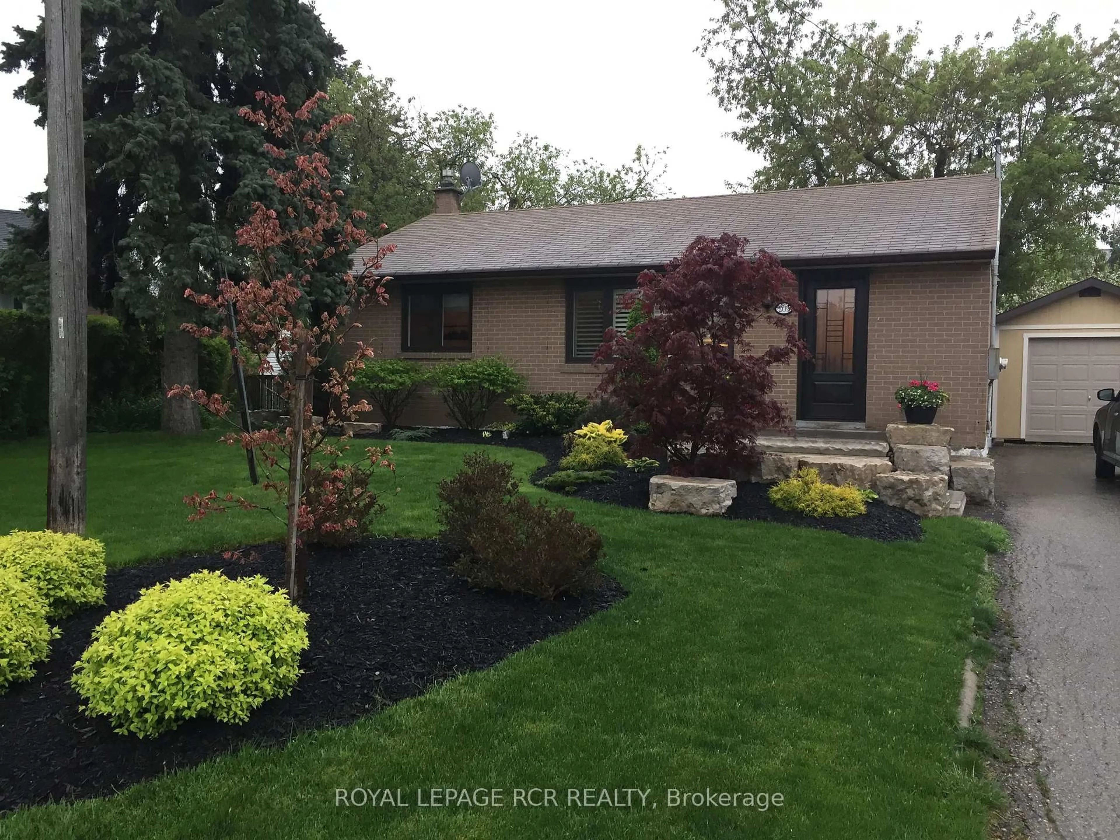 Home with vinyl exterior material, street for 205 Martha Cres, Caledon Ontario L7E 4X2