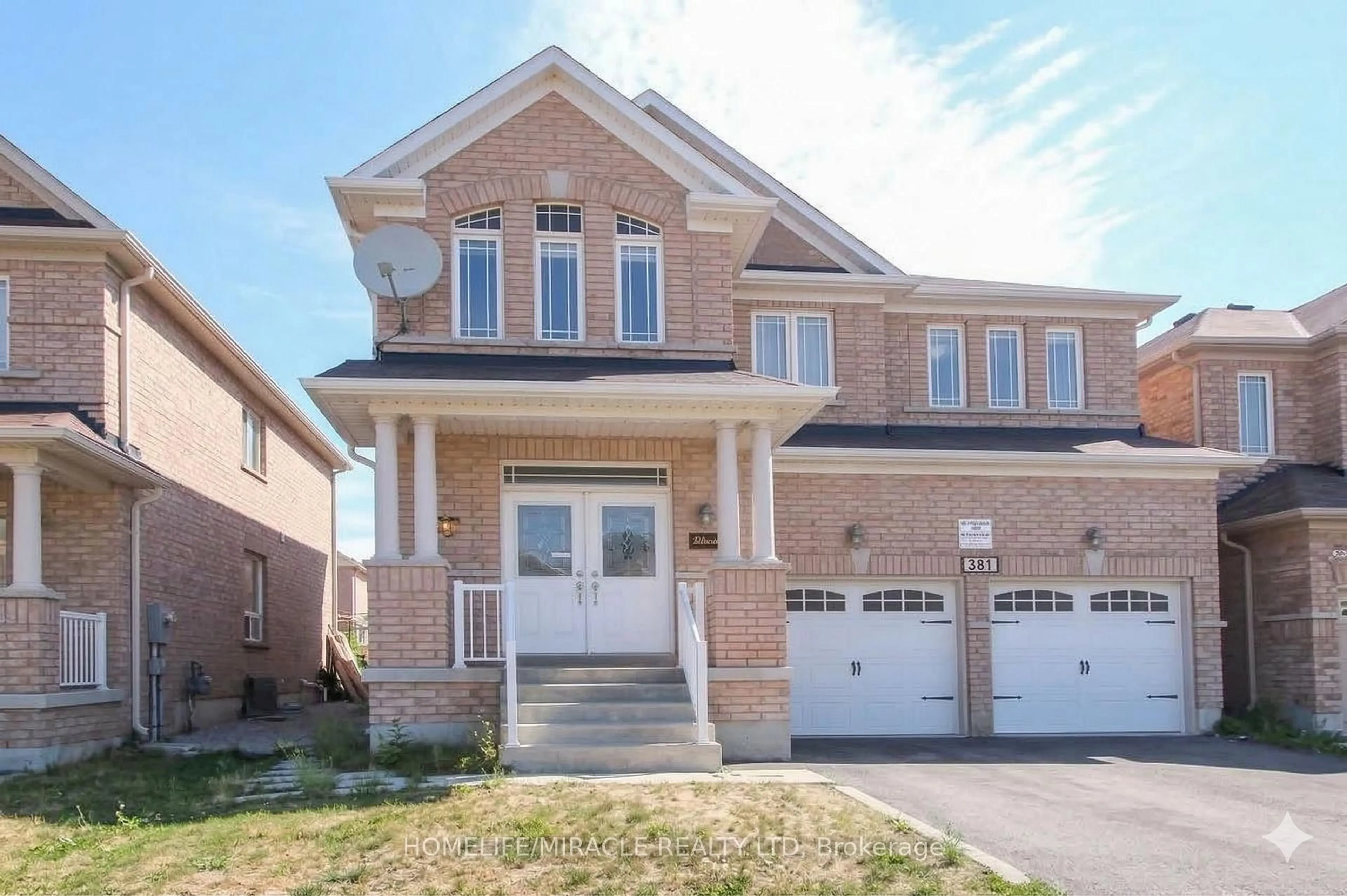 Home with brick exterior material, street for 381 Queen Mary Dr, Brampton Ontario L7A 3T1
