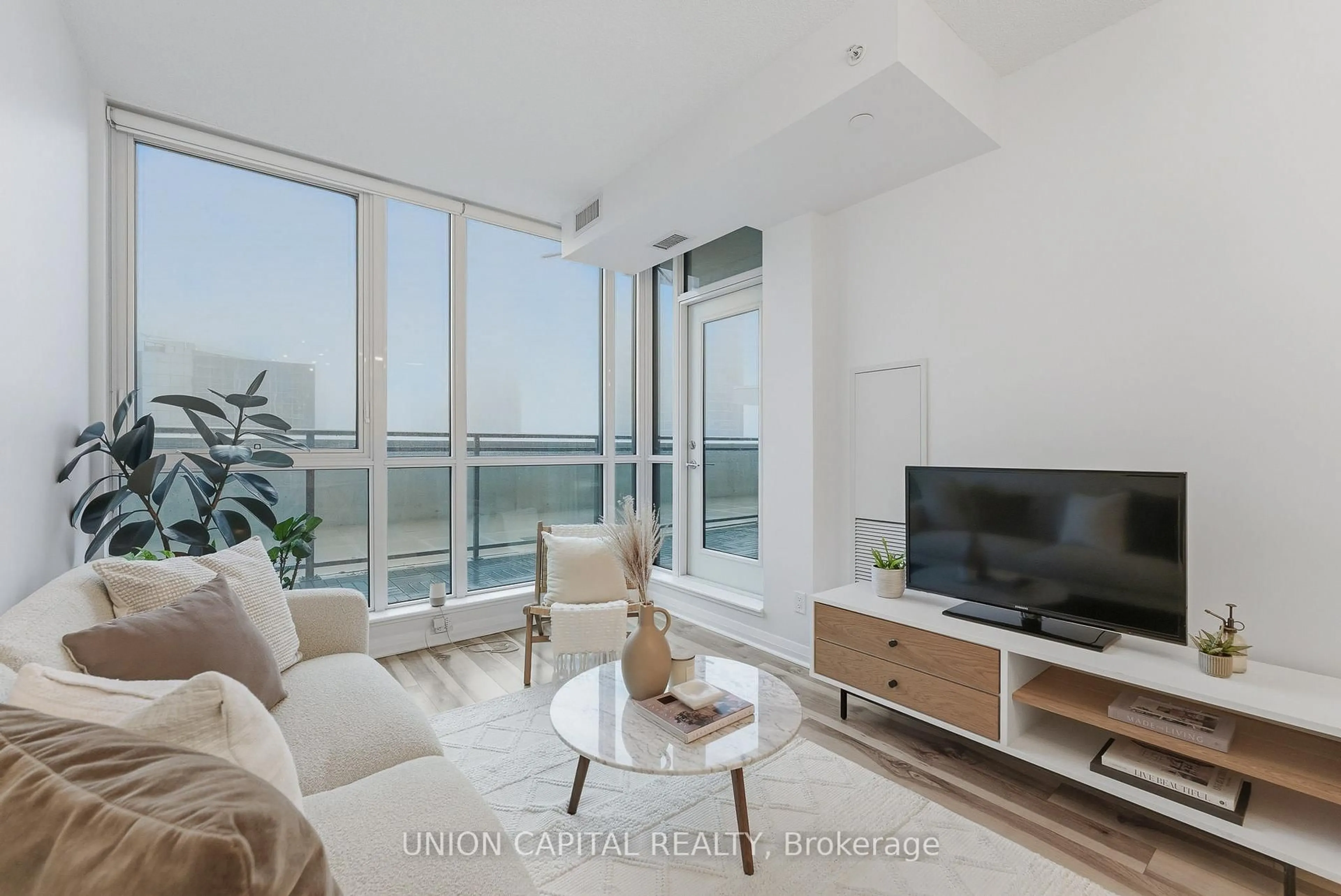 Living room with furniture, unknown for 55 Eglinton Ave #508, Mississauga Ontario L5R 0E4