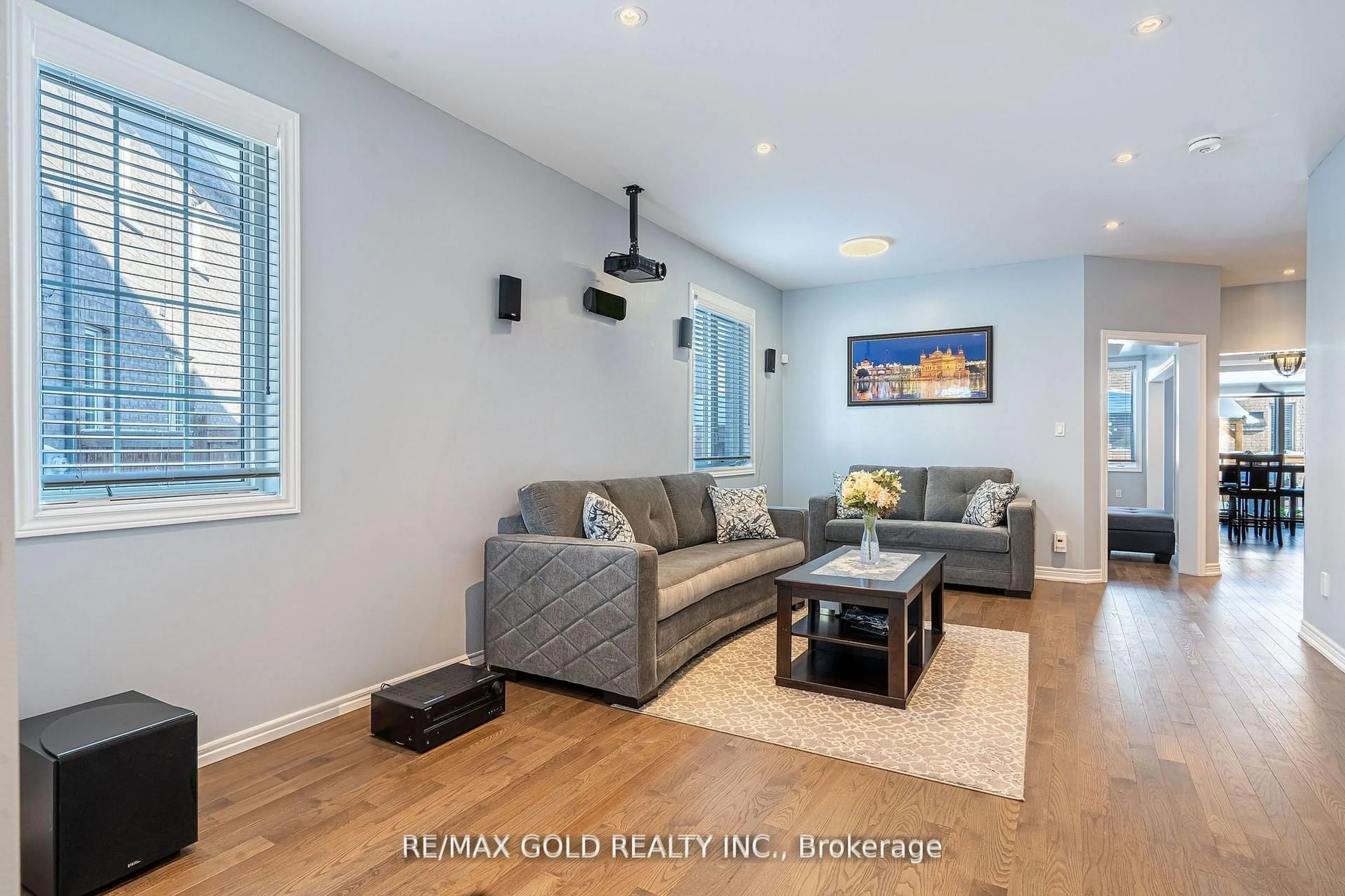 Living room with furniture, wood/laminate floor for 10 Spokanne St, Brampton Ontario L6R 4A2