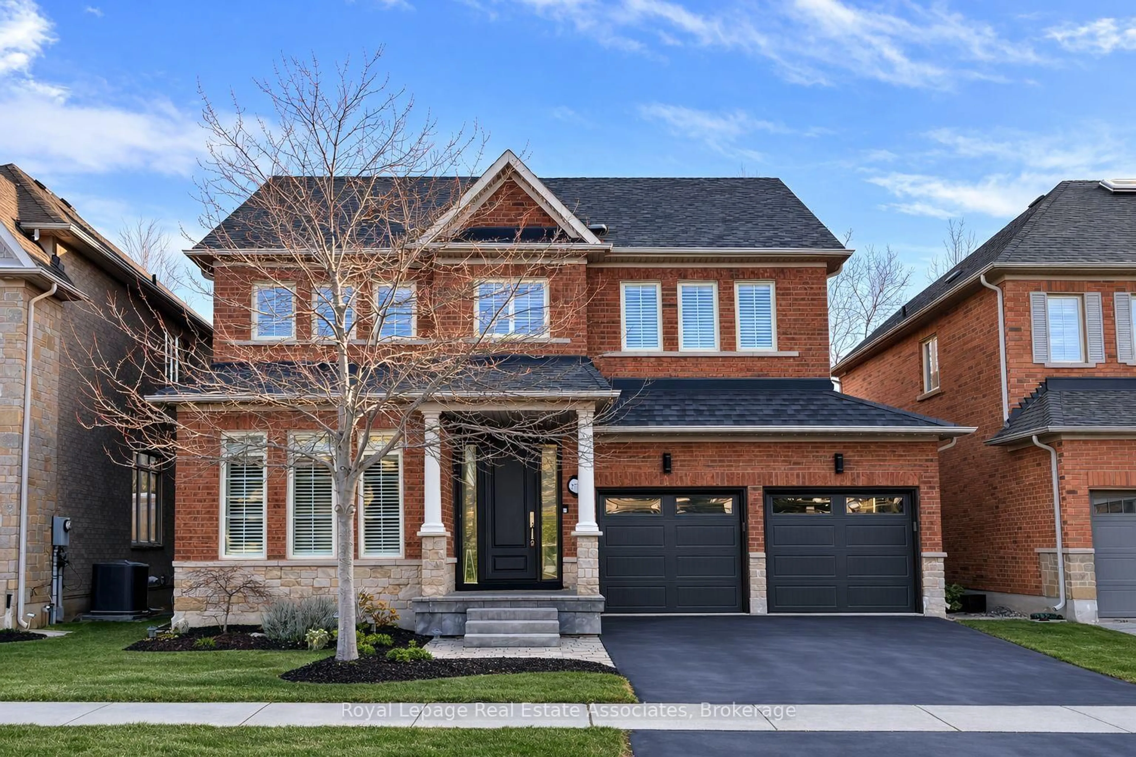 Home with brick exterior material, street for 273 Duskywing Way, Oakville Ontario L6L 6X5