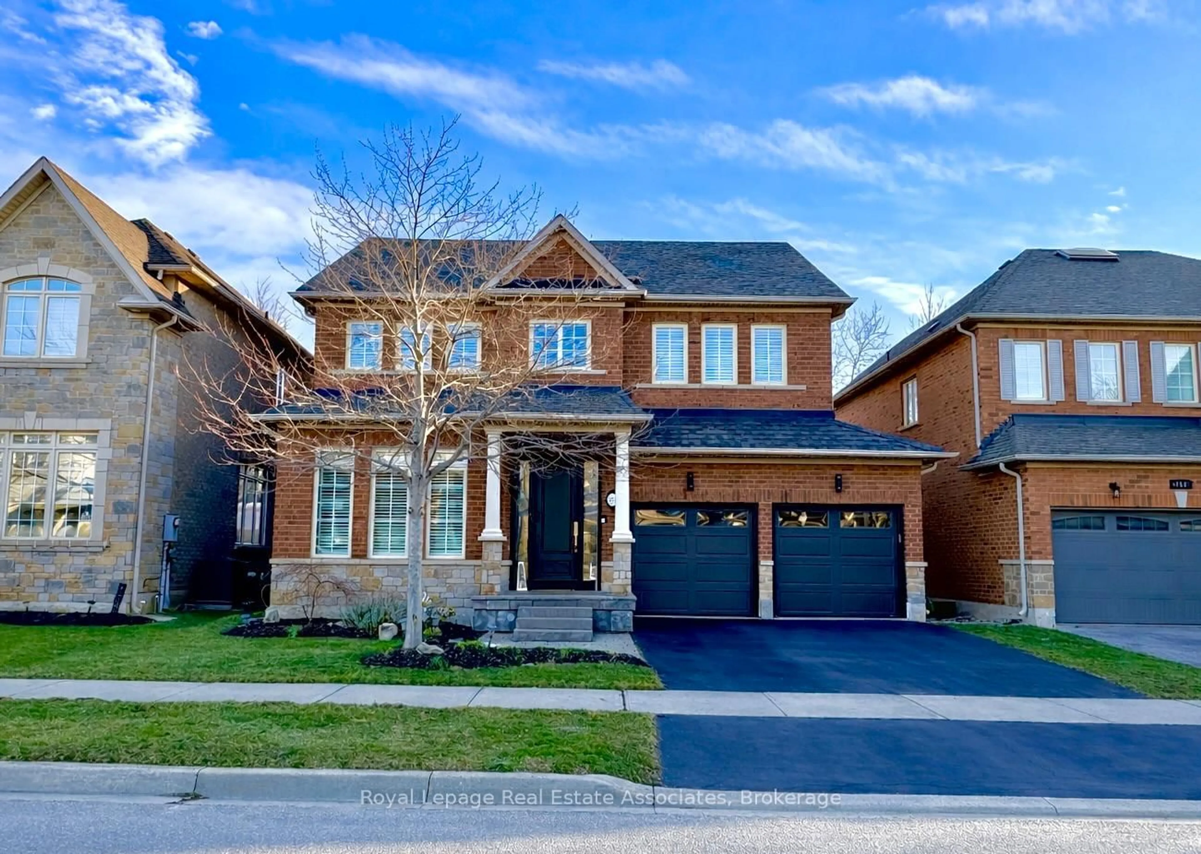 Home with brick exterior material, street for 273 Duskywing Way, Oakville Ontario L6L 6X5