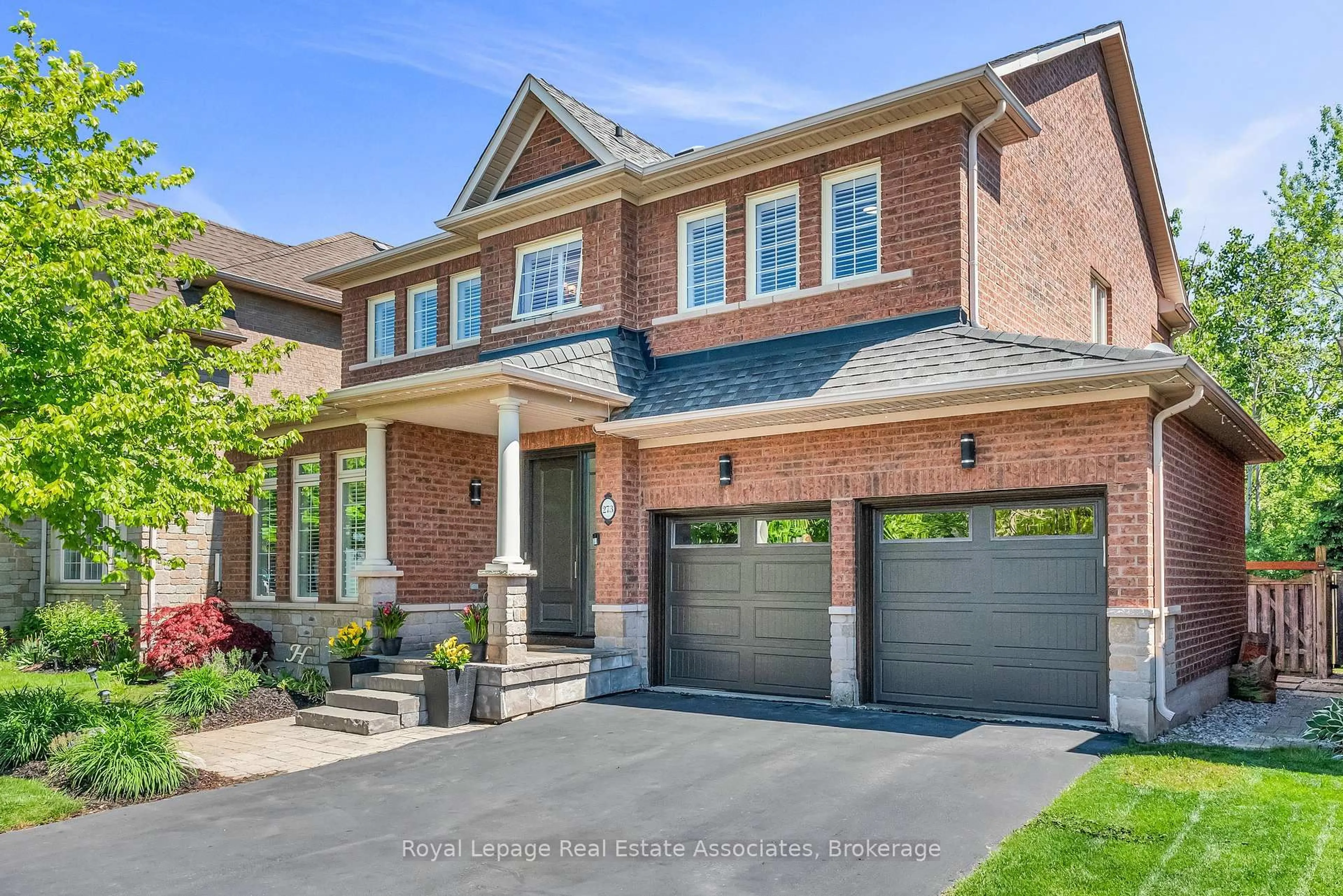Home with brick exterior material, street for 273 Duskywing Way, Oakville Ontario L6L 6X5