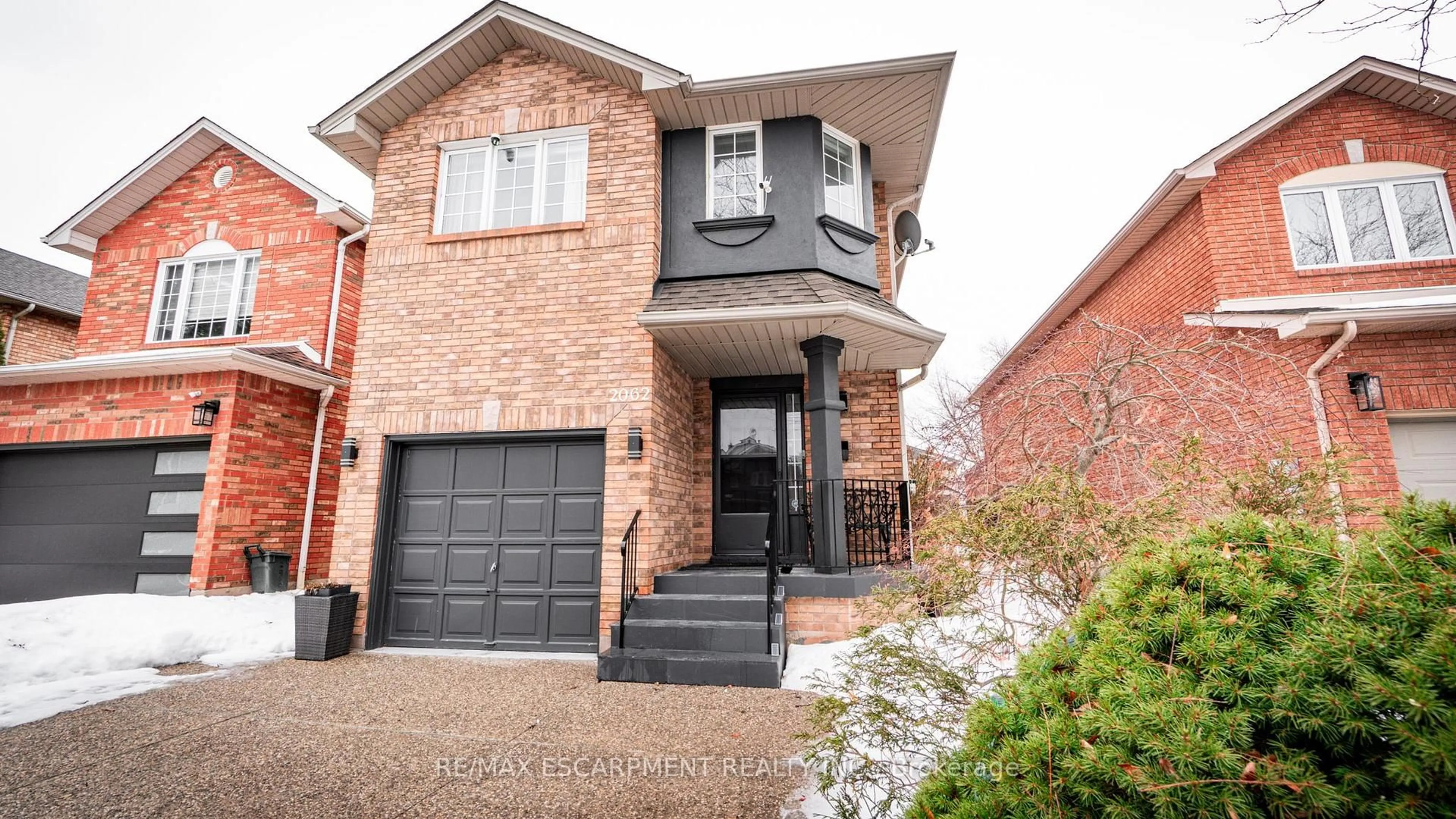 Home with brick exterior material, street for 2062 WESTMOUNT Dr, Oakville Ontario L6M 3P2