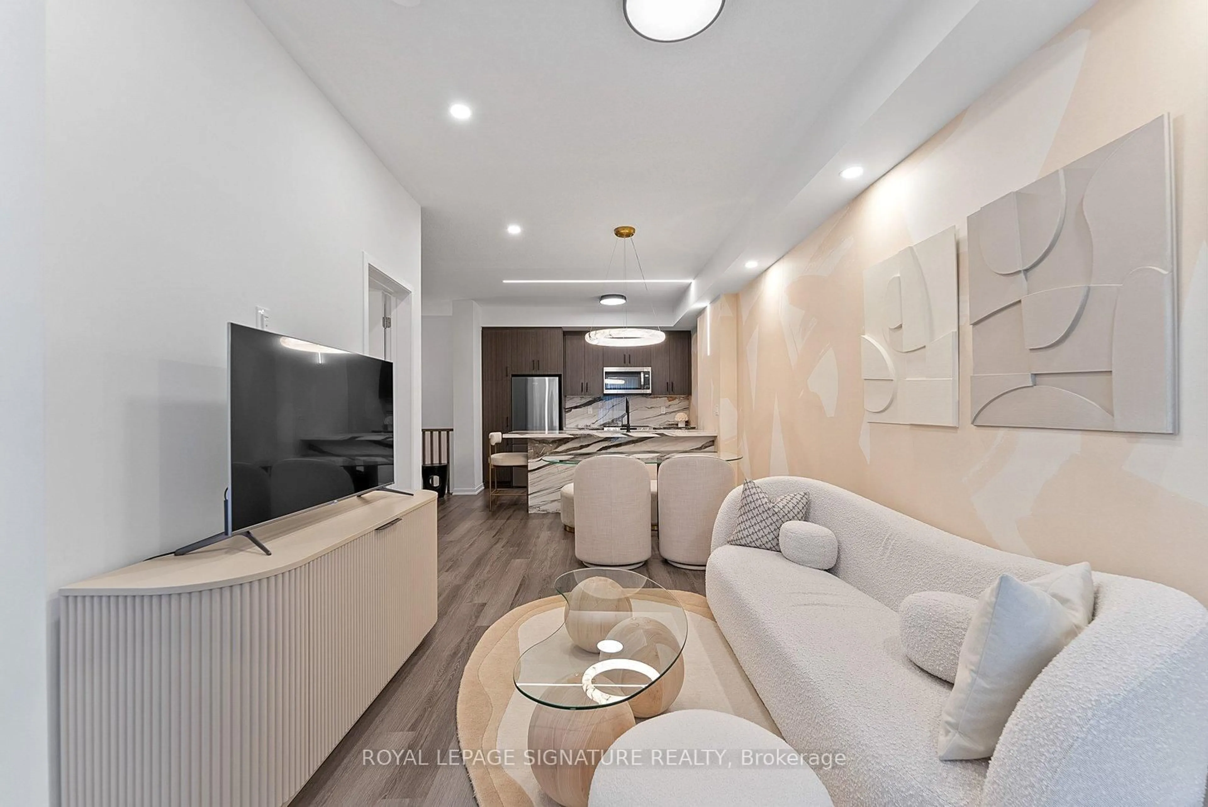 Living room with furniture, unknown for 30 William Jackson Way #TH114, Toronto Ontario M8V 0J7