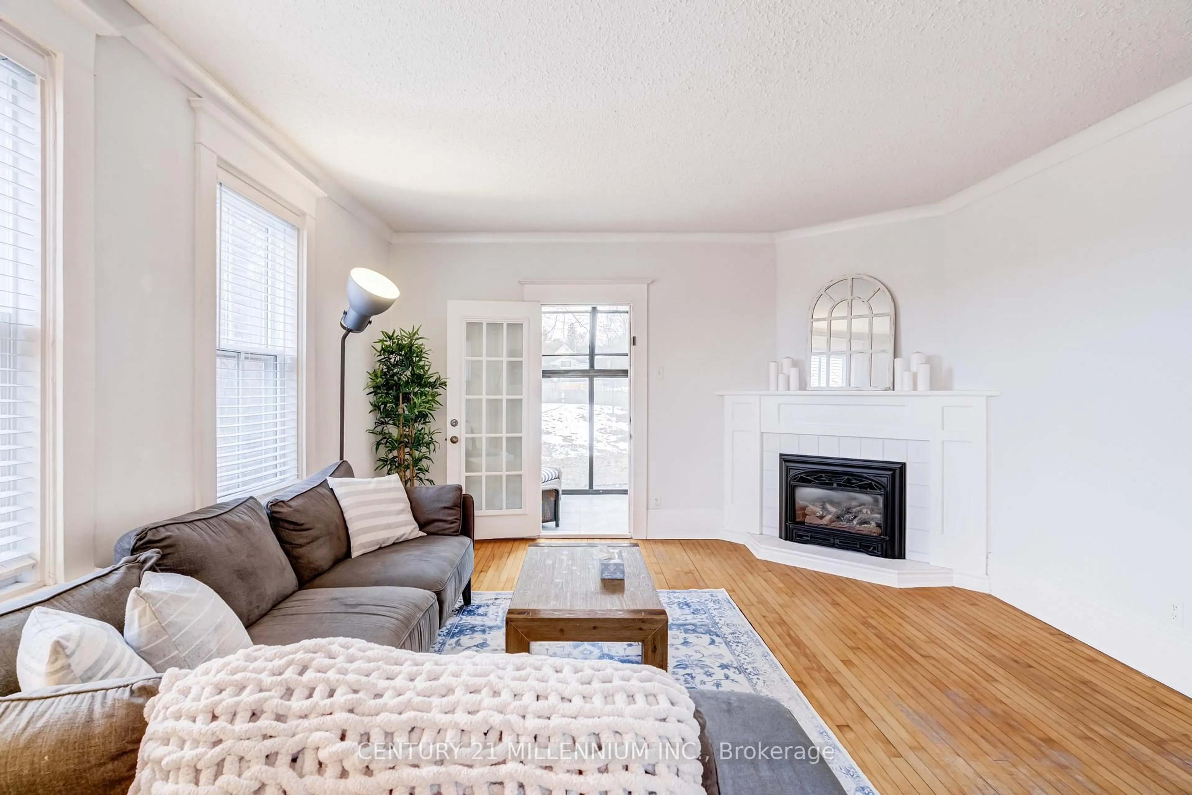 Living room with furniture, wood/laminate floor for 15614 McLaughlin Rd, Caledon Ontario L7C 1M3