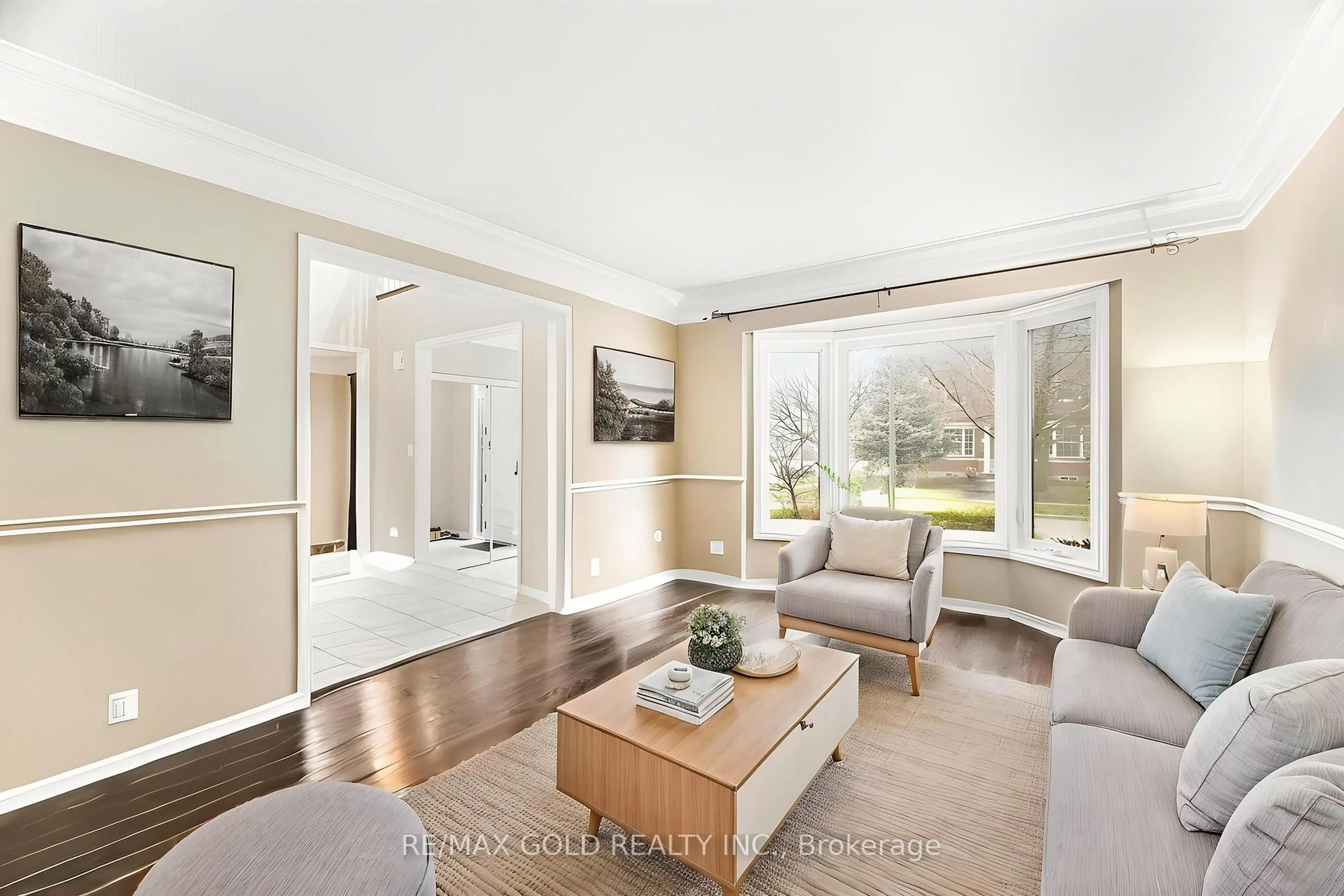 Living room with furniture, wood/laminate floor for 2441 Capilano Cres, Oakville Ontario L6H 6L3