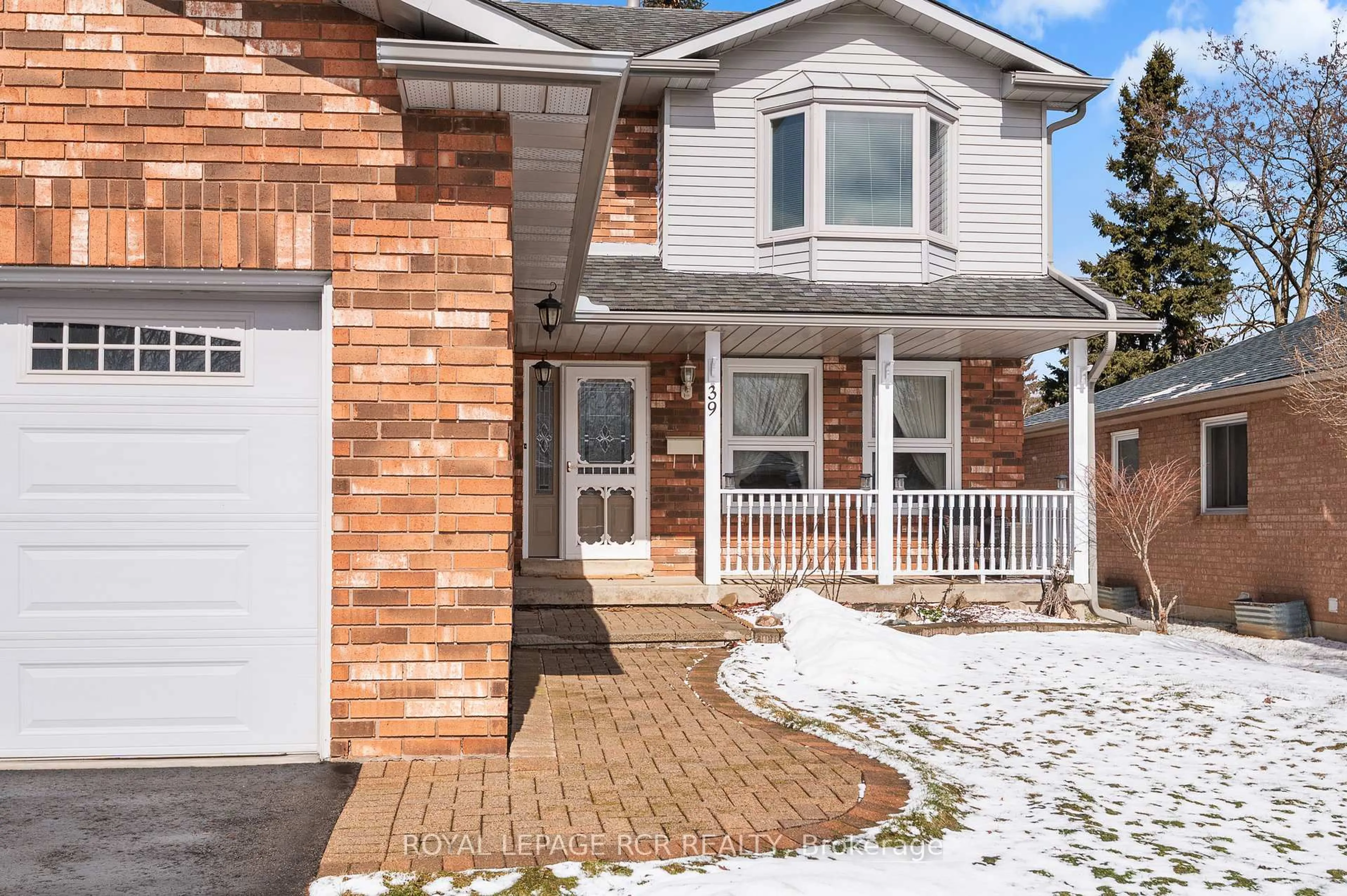 Home with brick exterior material, street for 39 Passmore Ave, Orangeville Ontario L9W 4K4