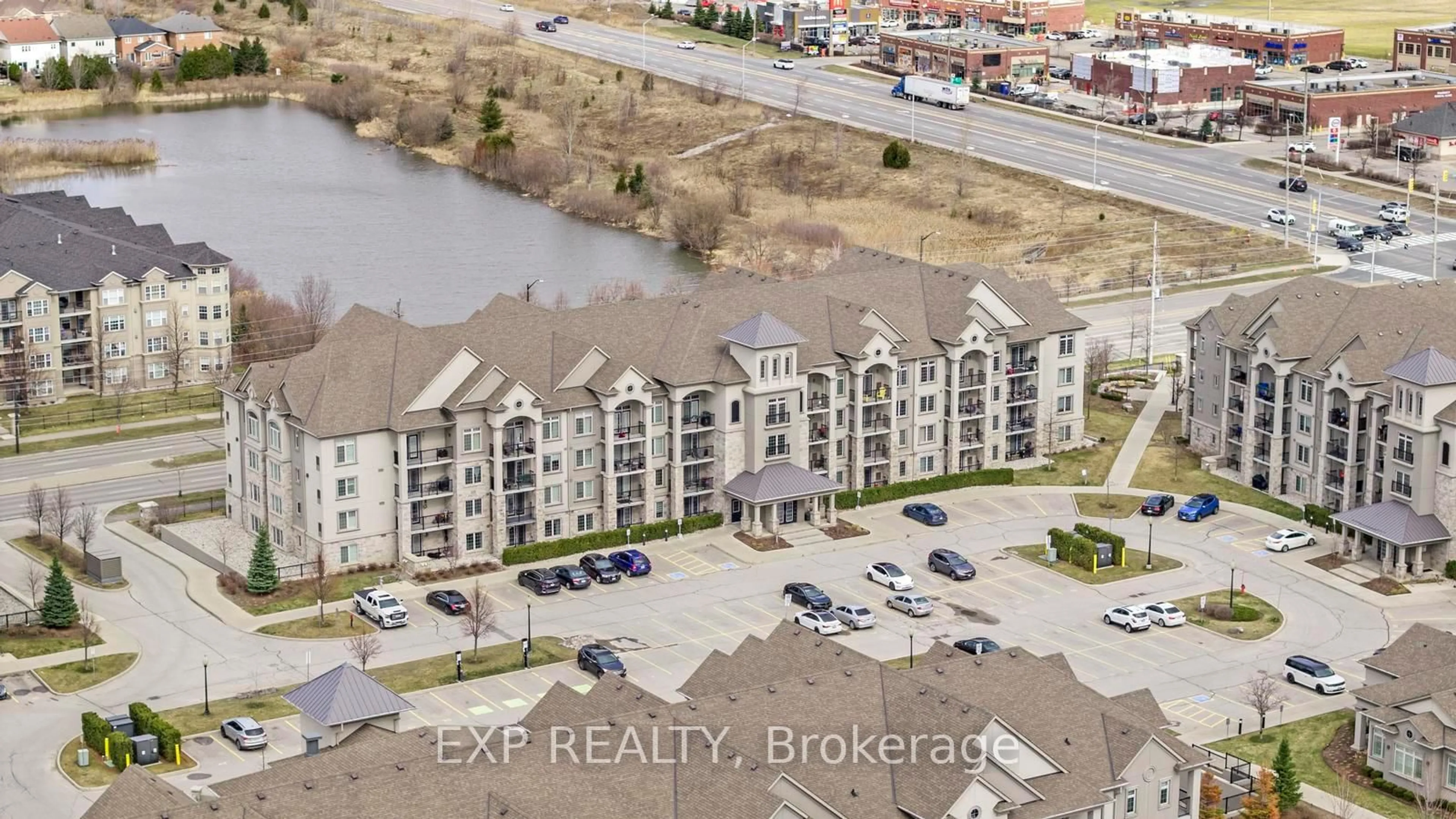 A pic from outside/outdoor area/front of a property/back of a property/a pic from drone, water/lake/river/ocean view for 1460 Main St #104, Milton Ontario L9T 8W5