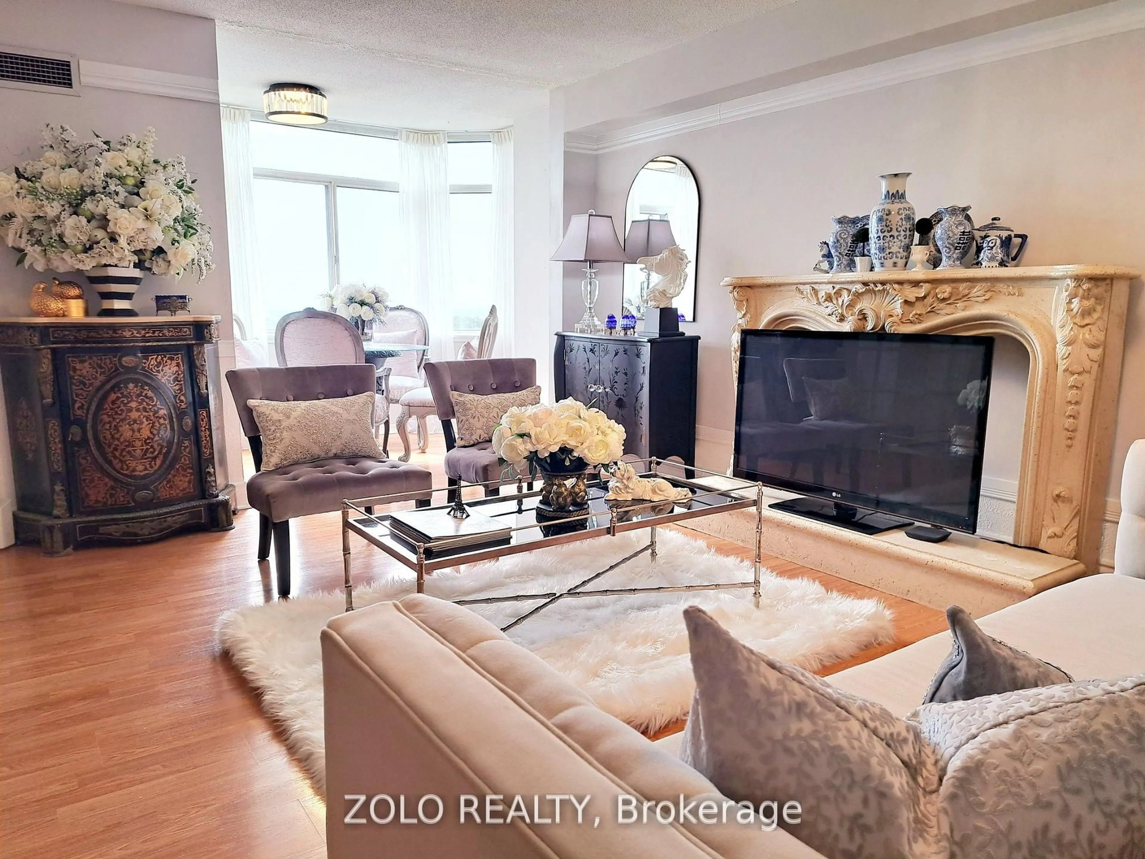 Living room with furniture, unknown for 300 Webb Dr #1001, Mississauga Ontario L5B 3W3