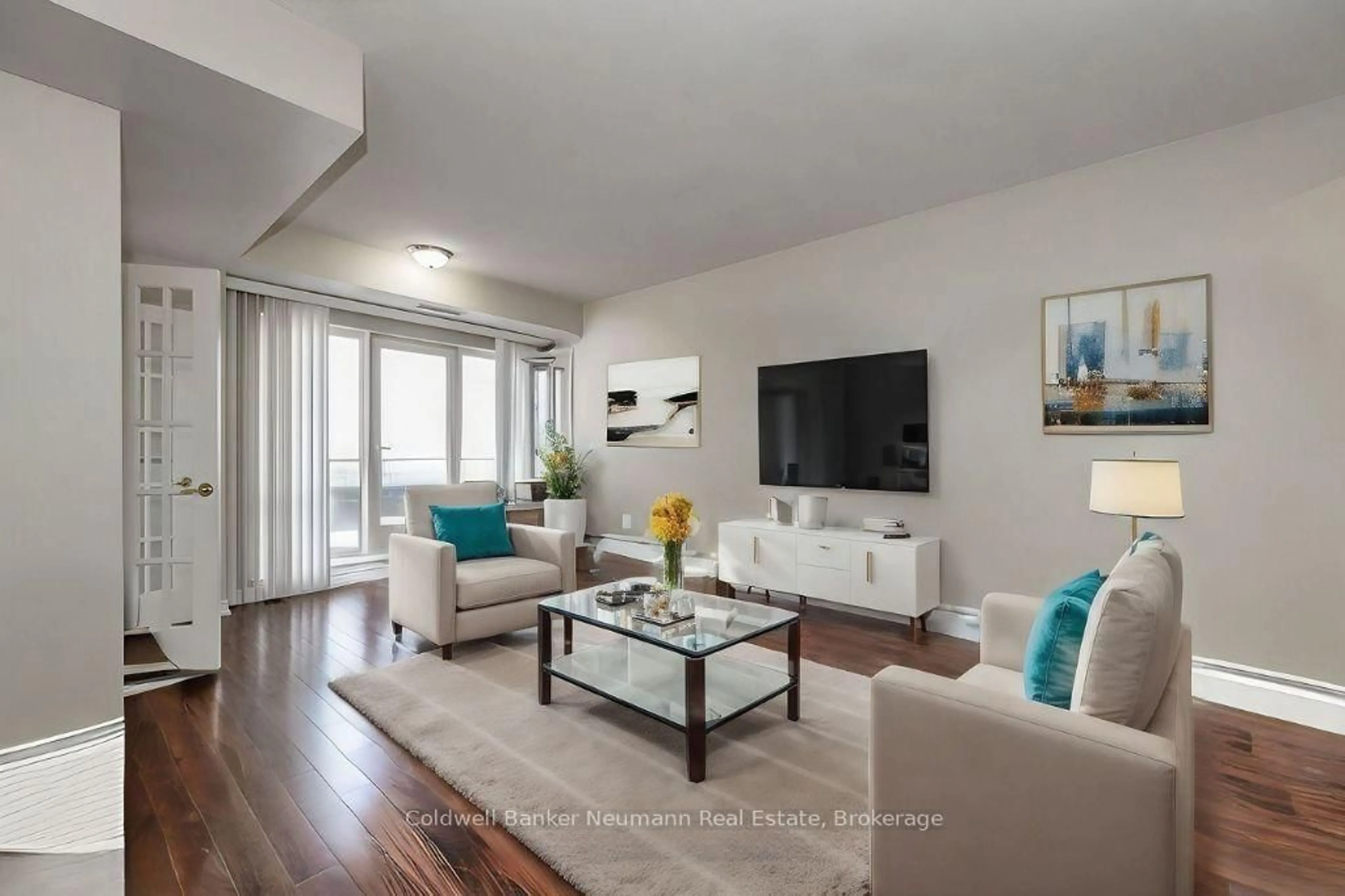 Living room with furniture, wood/laminate floor for 60 Old Mill Rd #409, Oakville Ontario L6J 7V9