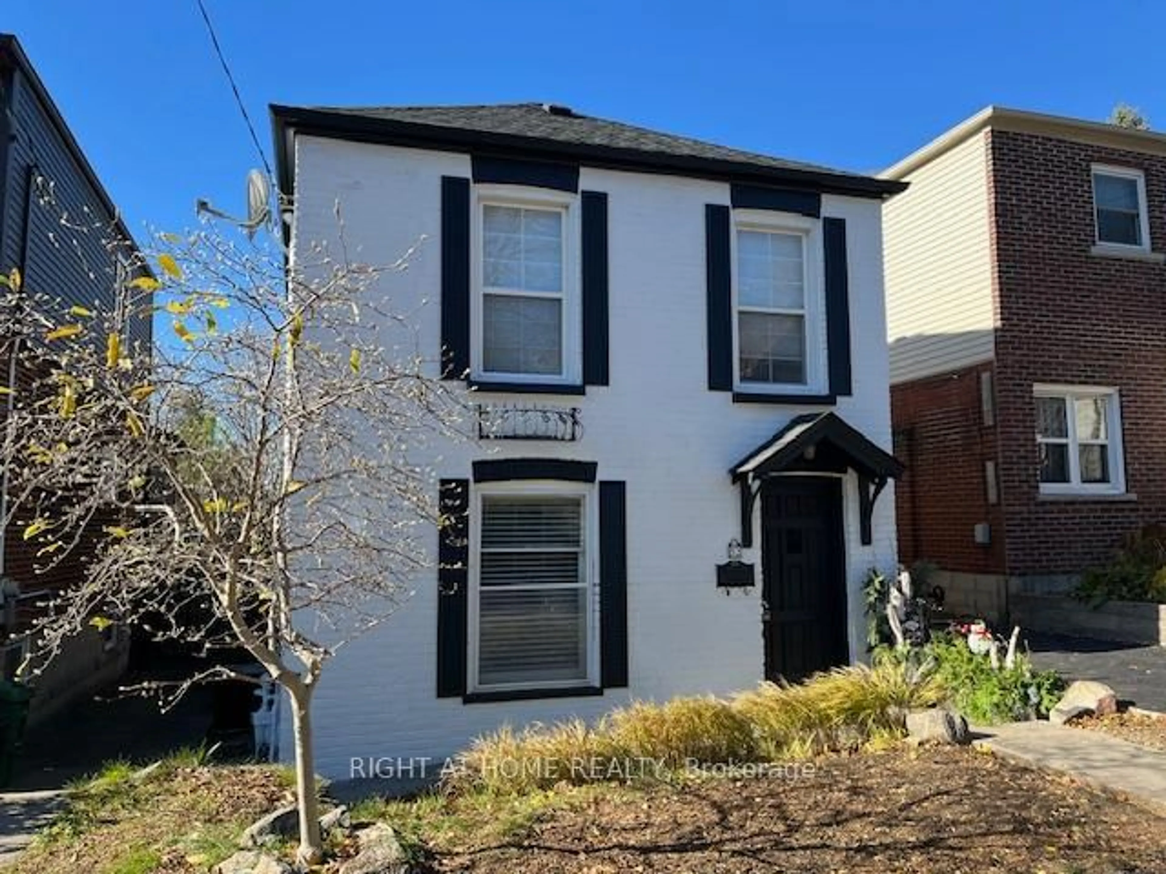 A pic from outside/outdoor area/front of a property/back of a property/a pic from drone, street for 52 Beresford Ave, Toronto Ontario M6S 3A8