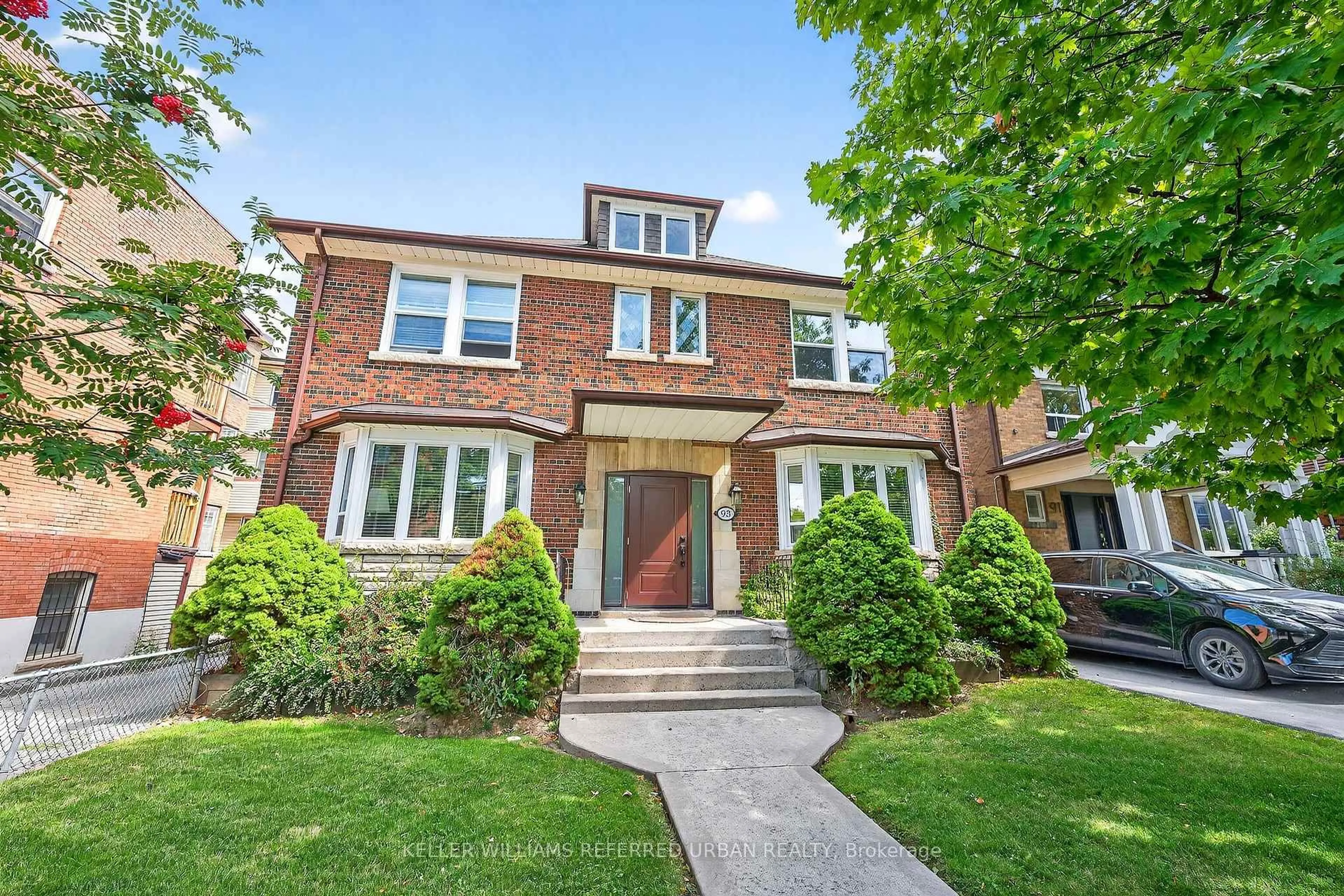 Home with brick exterior material, street for 93 Northcliffe Blvd, Toronto Ontario M6H 3H3