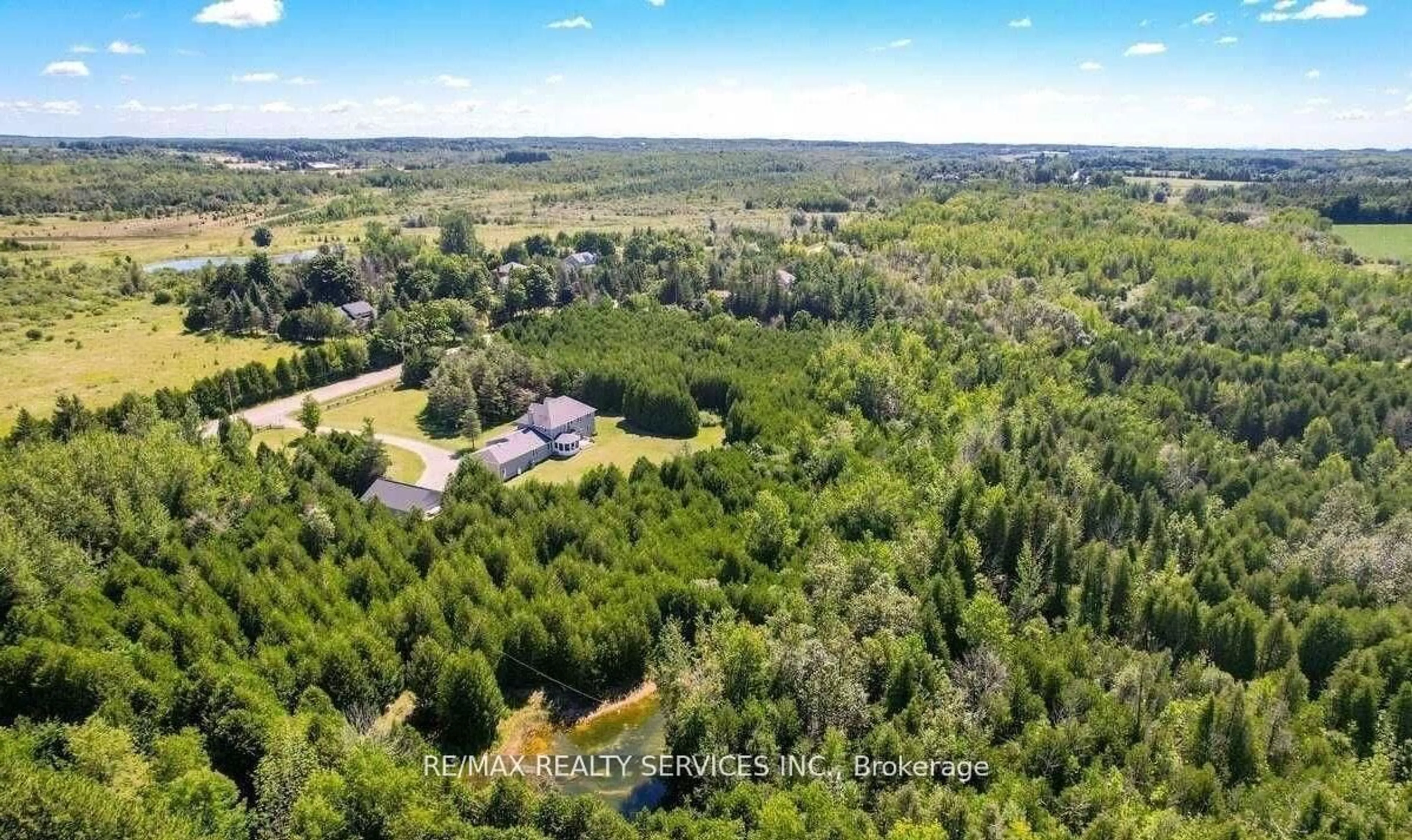 A pic from outside/outdoor area/front of a property/back of a property/a pic from drone, forest/trees view for 20040 Kennedy Rd, Caledon Ontario L7K 1Y3