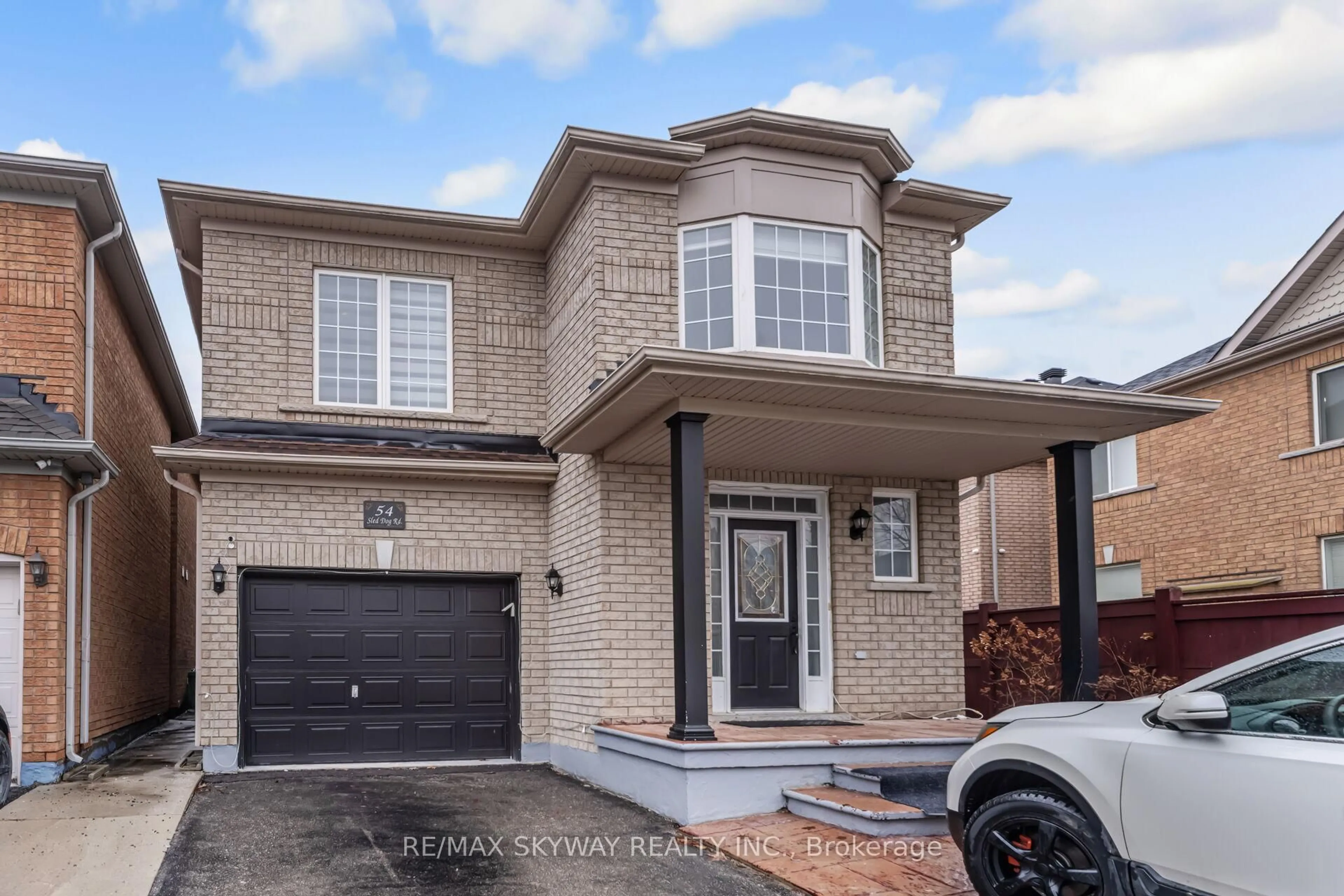 Home with brick exterior material, street for 54 Sled Dog Rd, Brampton Ontario L6R 0J7