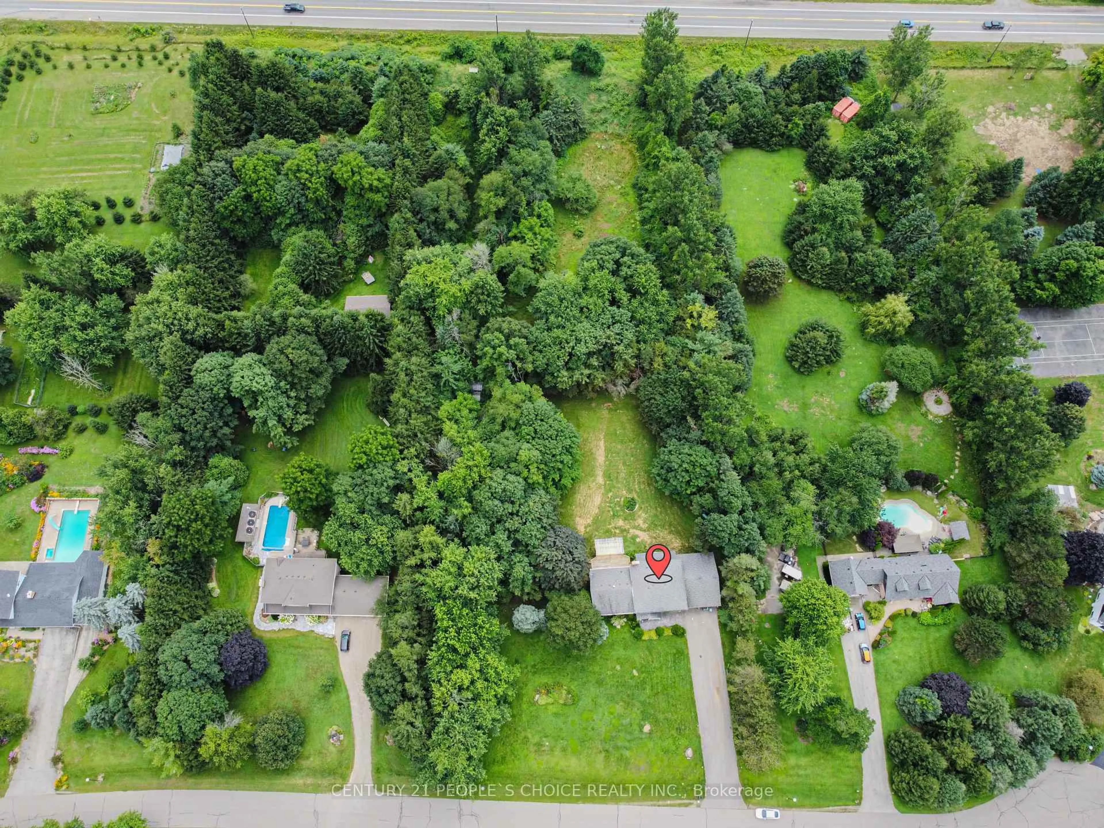 A pic from outside/outdoor area/front of a property/back of a property/a pic from drone, forest/trees view for 8 Glenn Crt, Caledon Ontario L7K 0P2