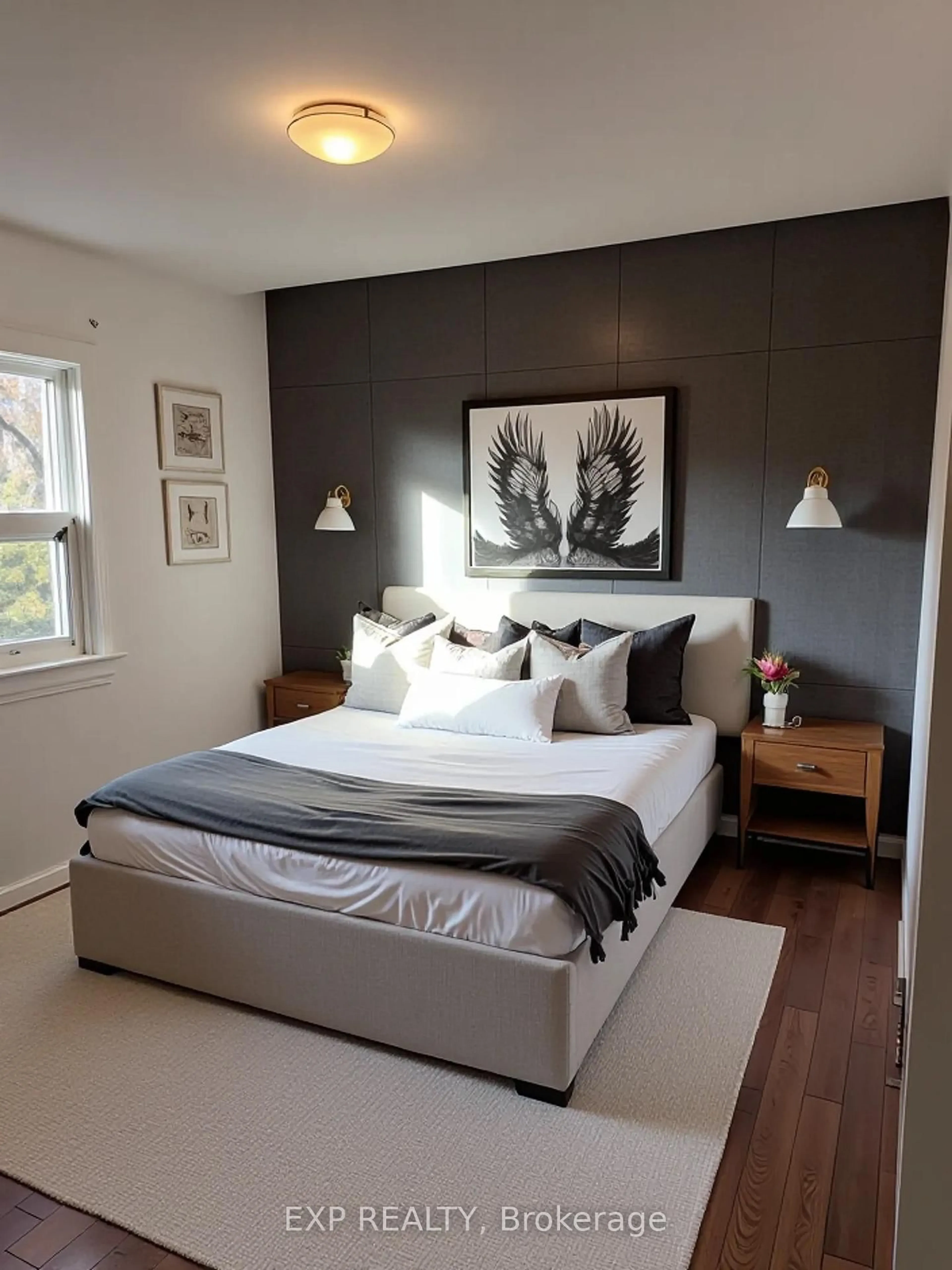 Bedroom with bed, wood/laminate floor for 26 Avon Ave, Toronto Ontario M6N 3W7