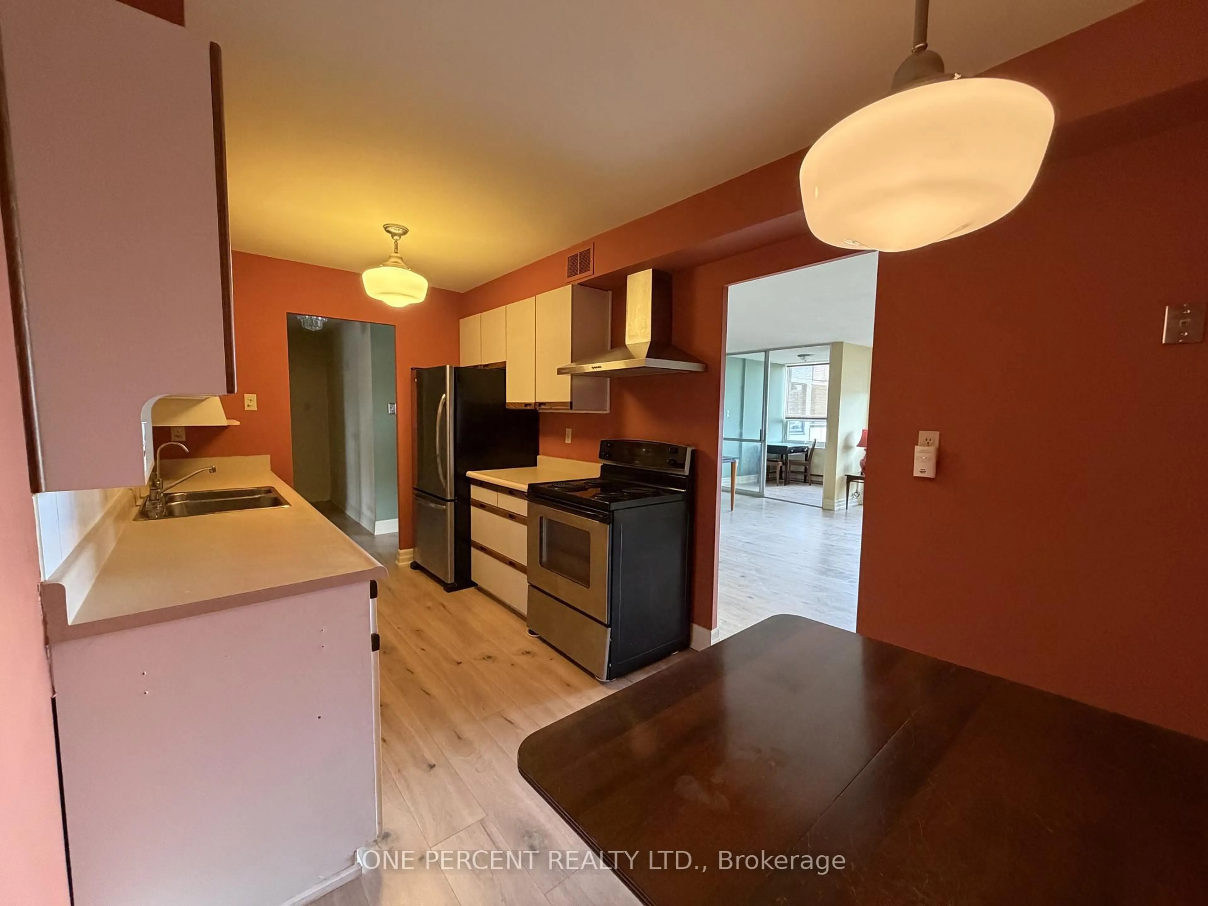 Open concept kitchen, wood/laminate floor for 61 Richview Rd #1402, Toronto Ontario M9A 4M8