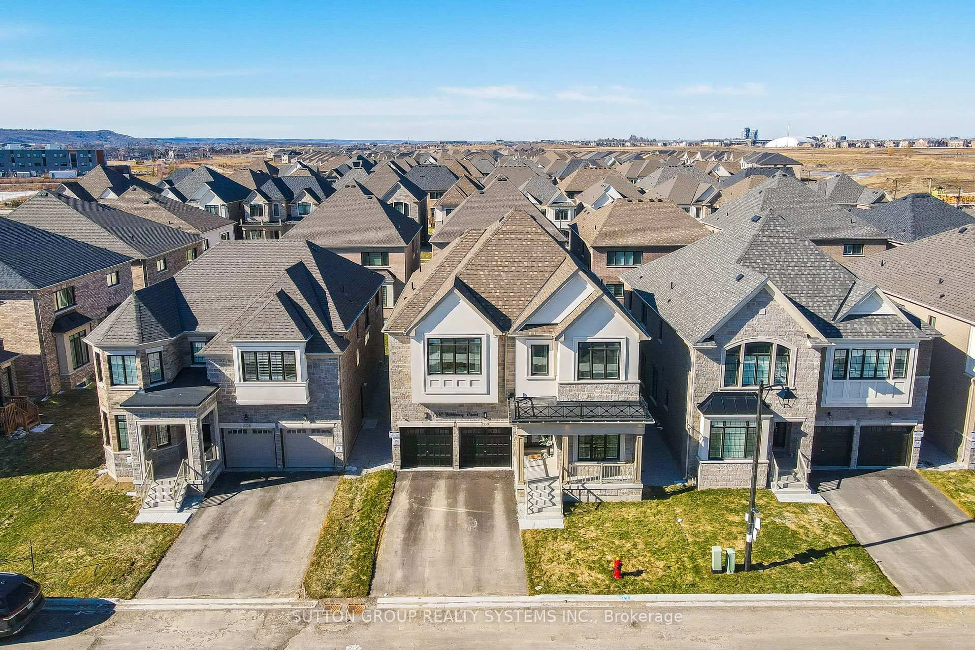 A pic from outside/outdoor area/front of a property/back of a property/a pic from drone, street for 1530 Buttercup Crt, Milton Ontario L9E 2G3