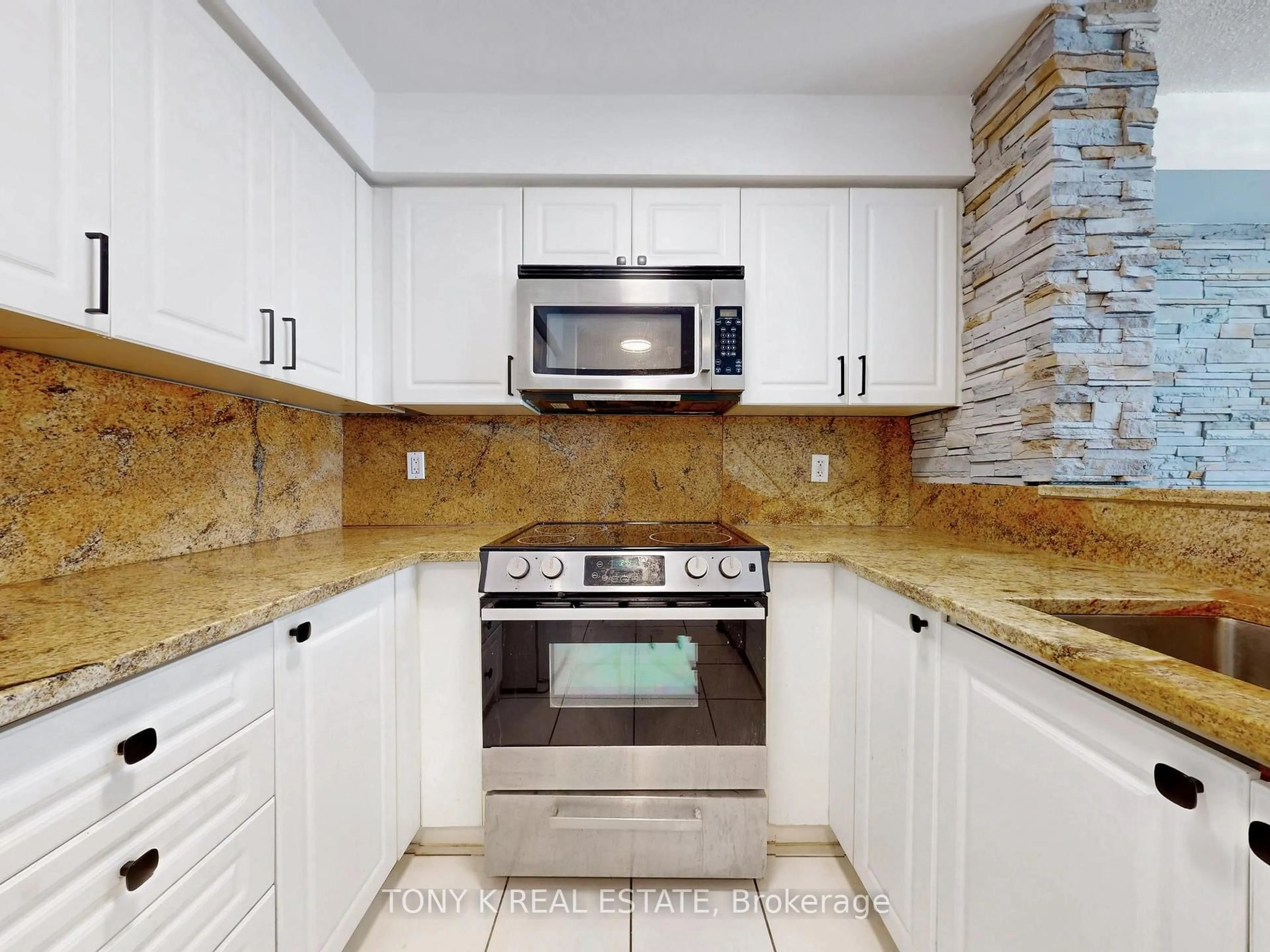 Standard kitchen, ceramic/tile floor for 7 Michael Power Pl #1002, Toronto Ontario M9A 0A4