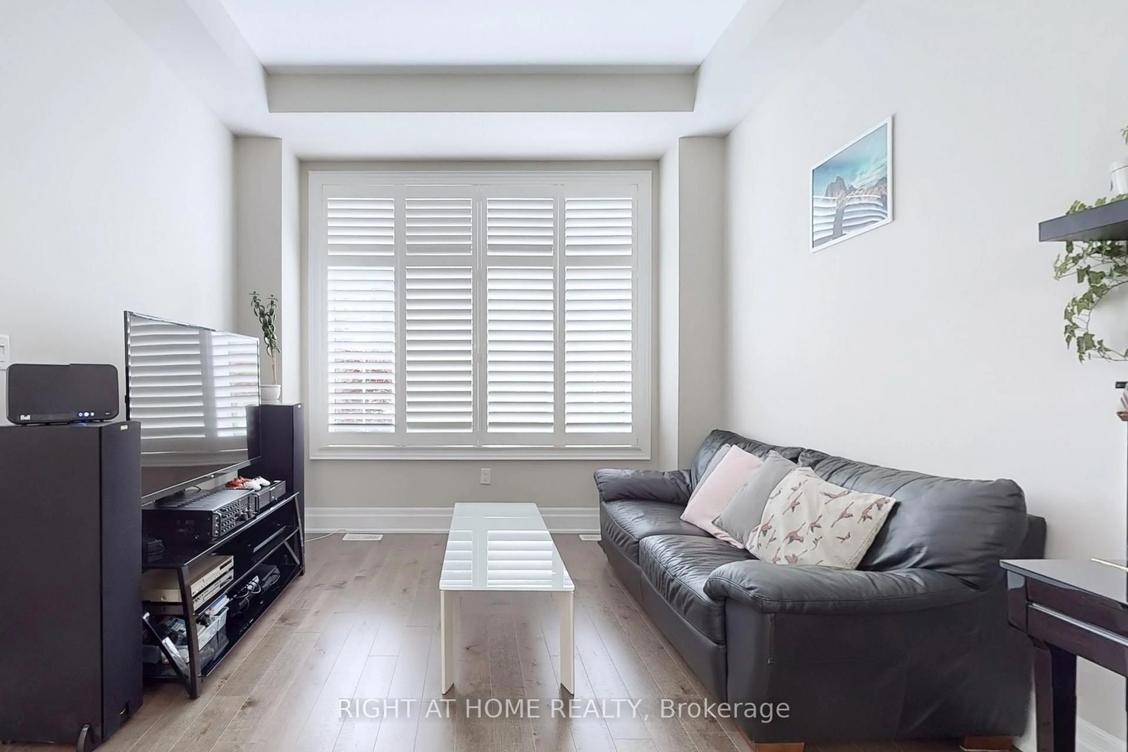 Living room with furniture, wood/laminate floor for 421 Ginger Gate, Oakville Ontario L6M 1N2