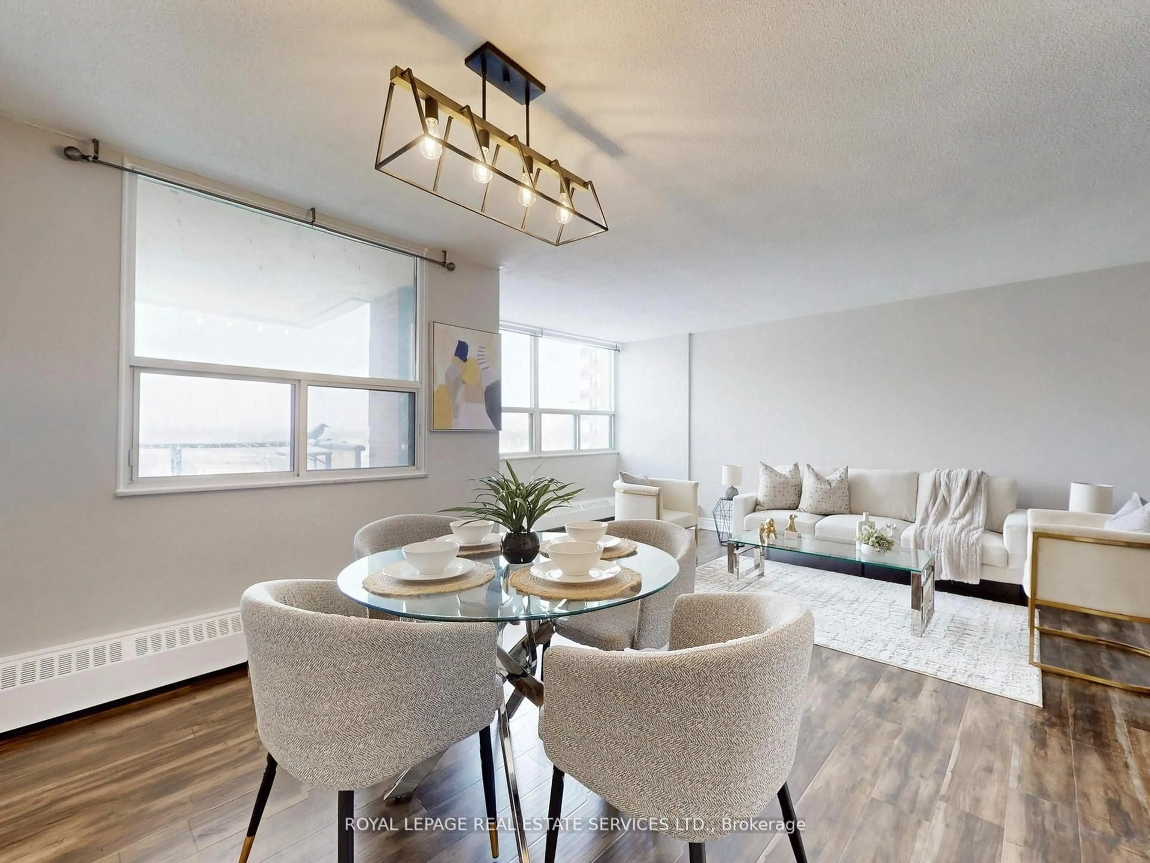 Dining room, wood/laminate floor for 551 The West Mall #702, Toronto Ontario M9C 1G7