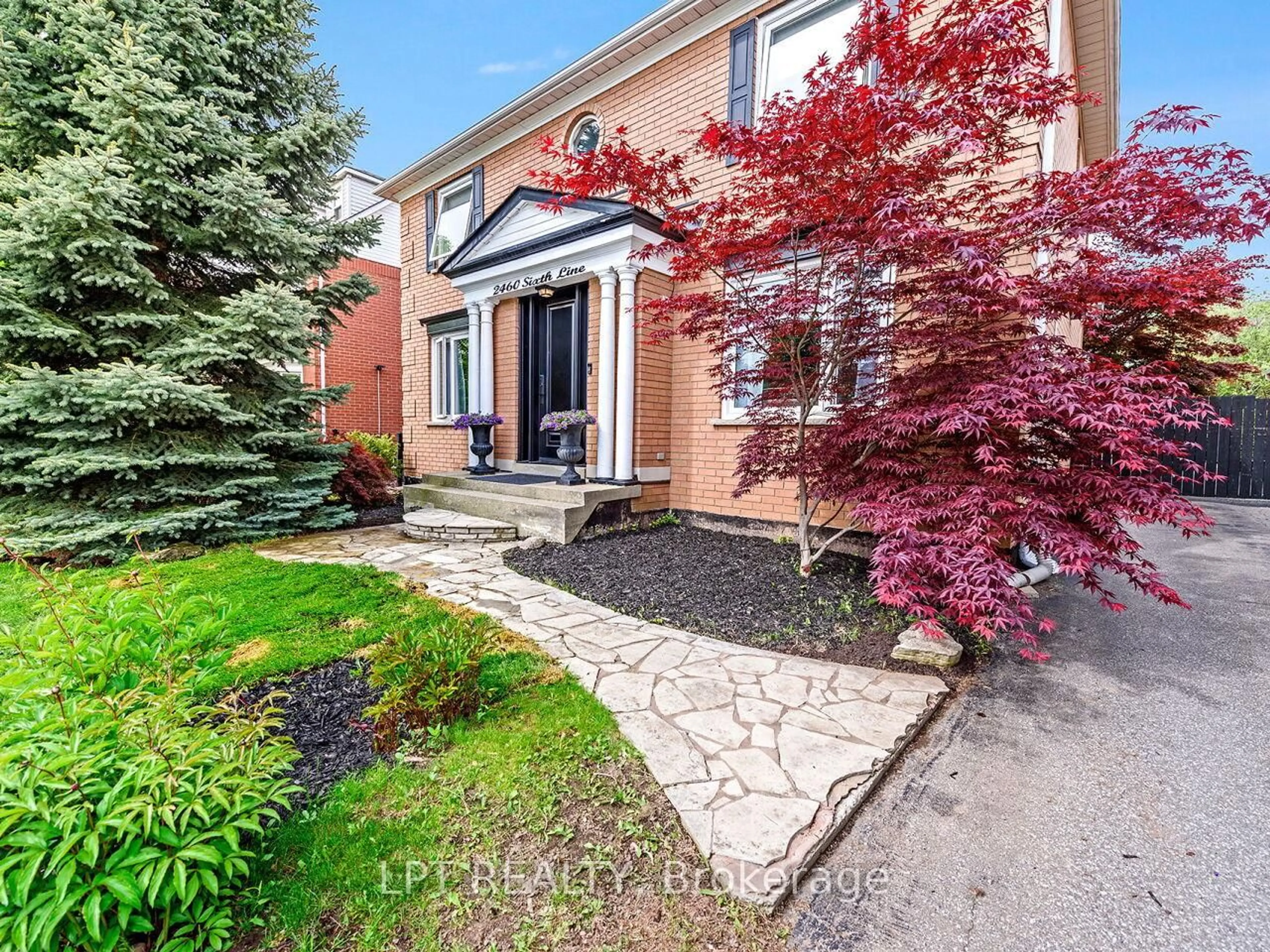 Home with brick exterior material, street for 2460 Sixth Line, Oakville Ontario L6H 5Z8