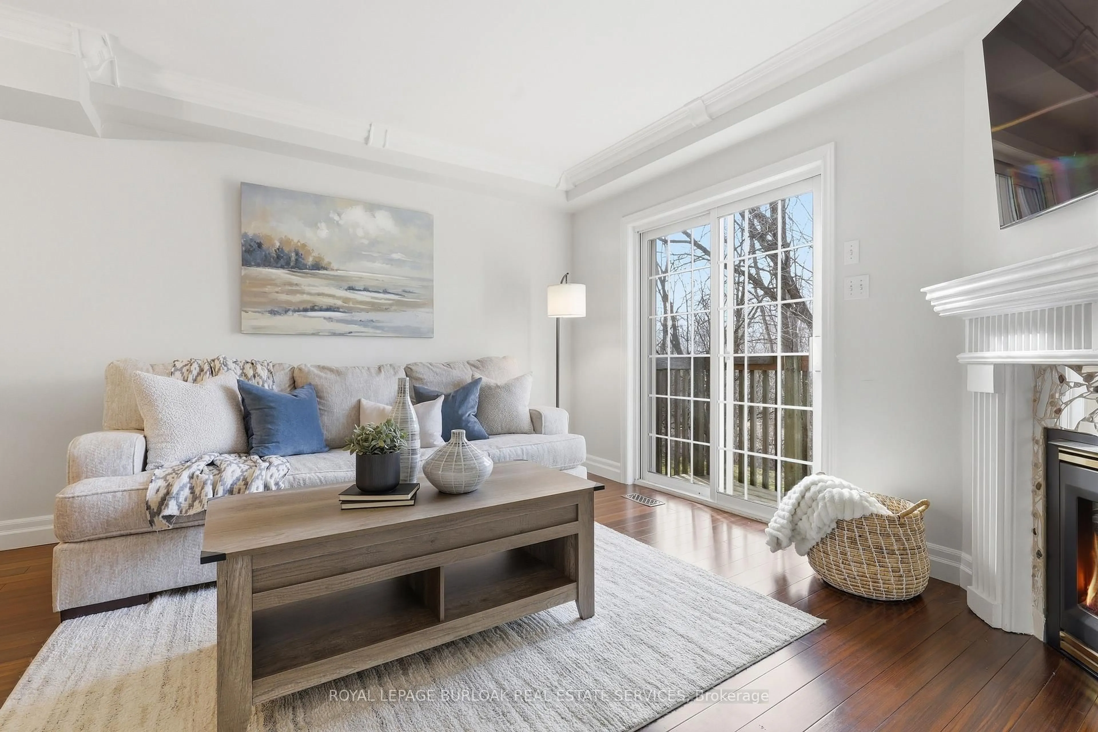 Living room with furniture, wood/laminate floor for 3480 Upper Middle Rd #56, Burlington Ontario L7M 4R7