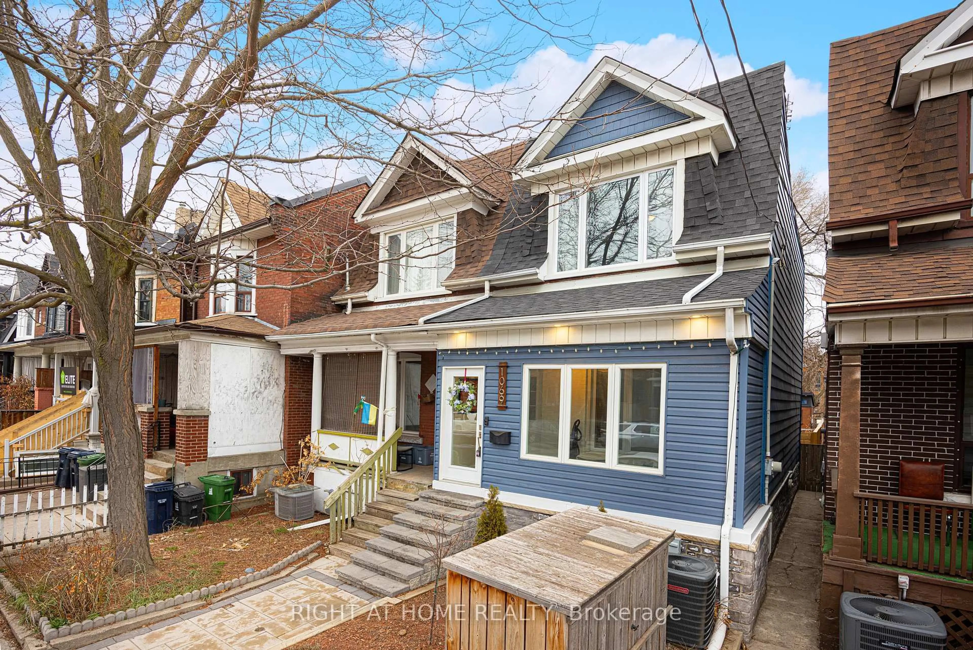 Home with brick exterior material, street for 1069 Dovercourt Ave, Toronto Ontario M6H 2X7