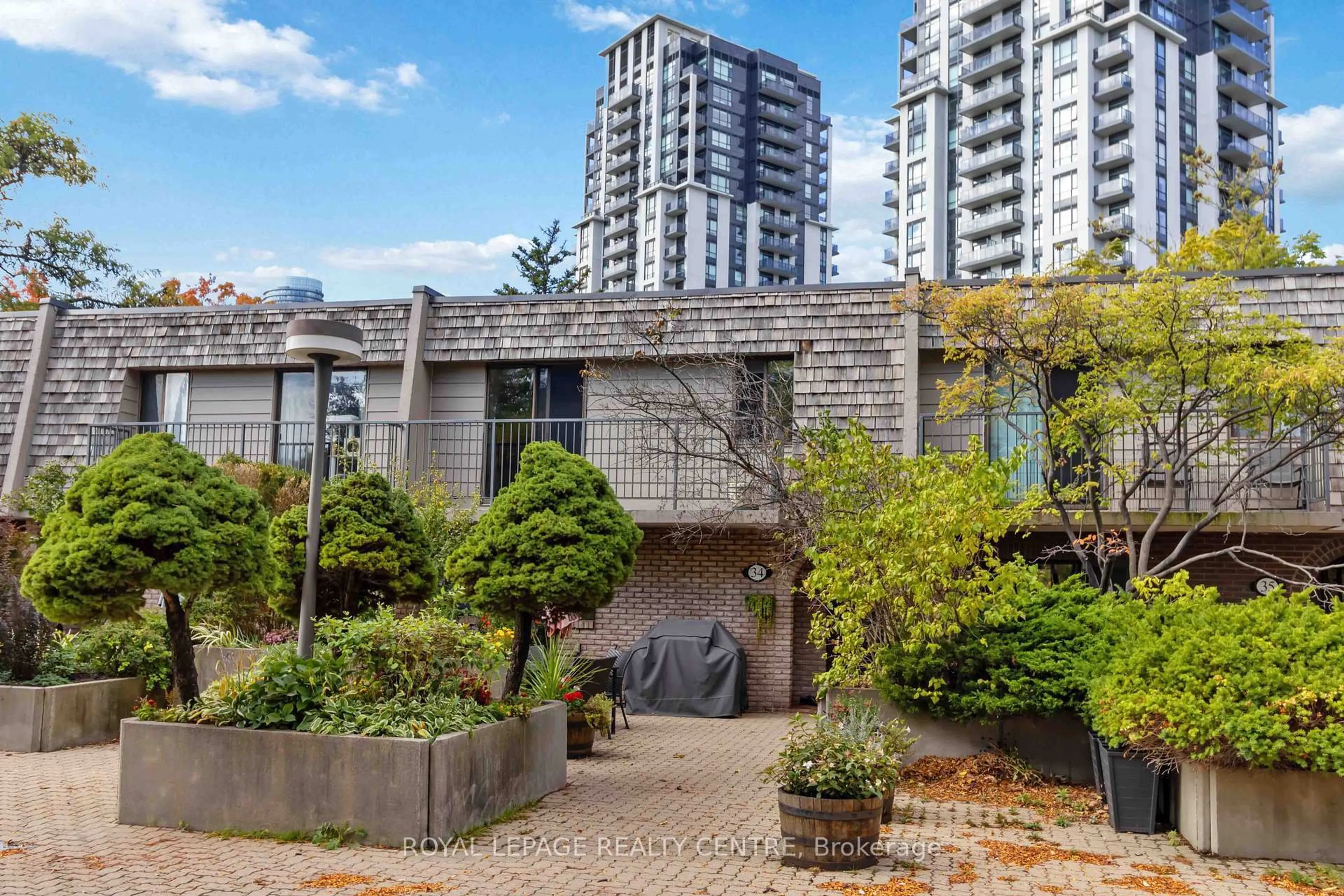 Patio, city buildings view from balcony for 1330 Mississauga Valley Blvd #34, Mississauga Ontario L5A 3T1