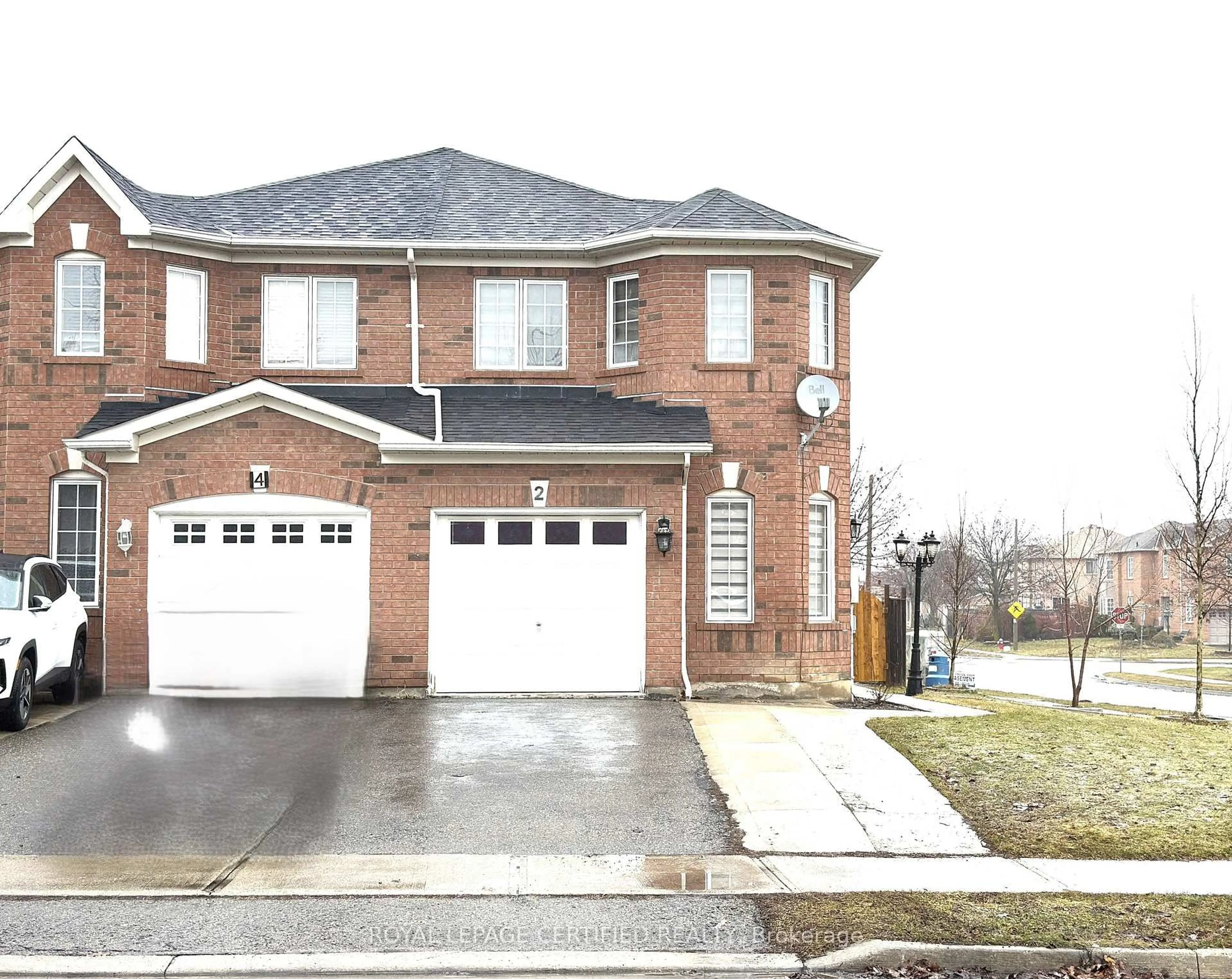 Home with brick exterior material, street for 2 Lake Louise Dr, Brampton Ontario L6X 4W7