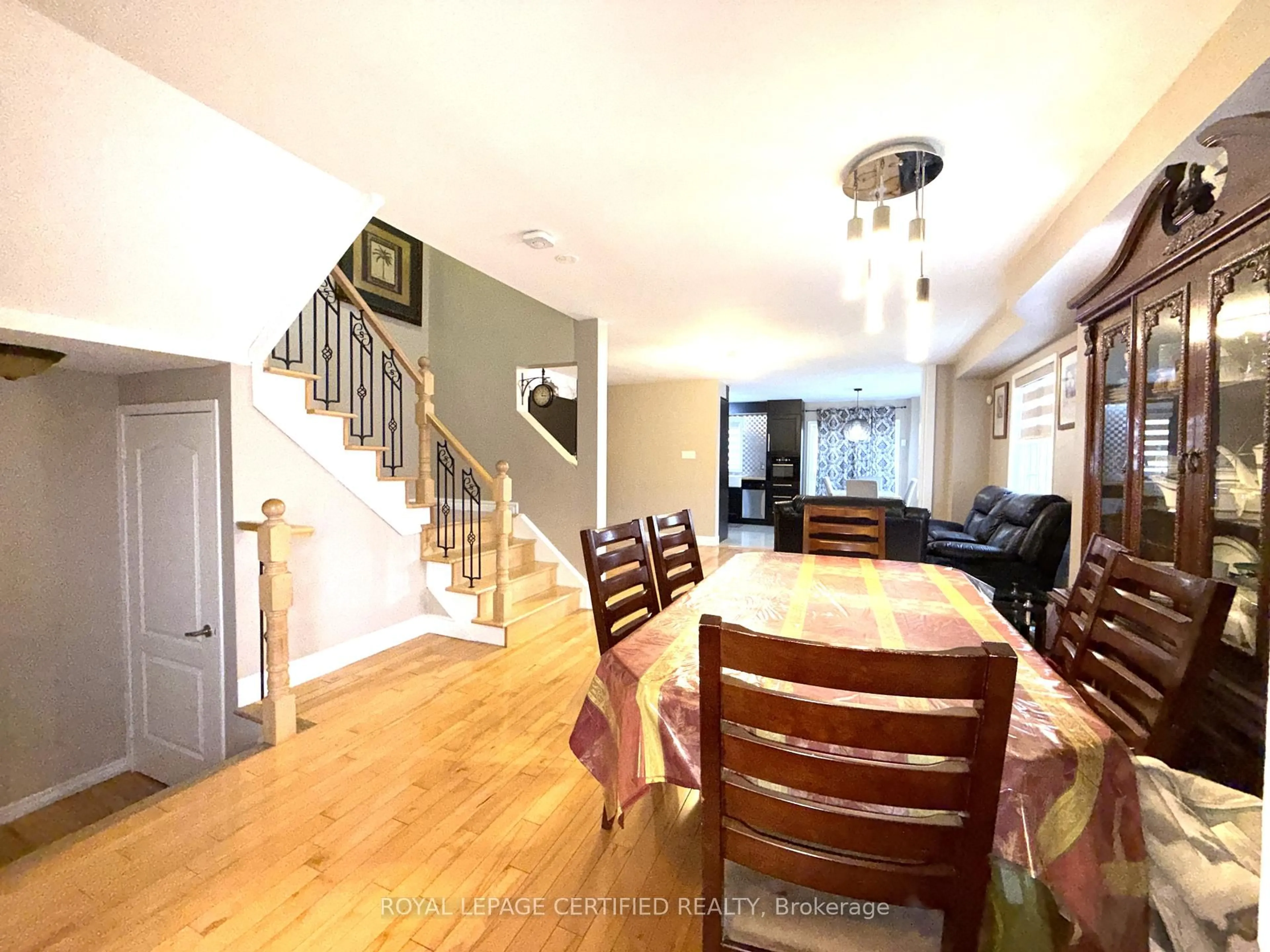 Dining room, wood/laminate floor for 2 Lake Louise Dr, Brampton Ontario L6X 4W7