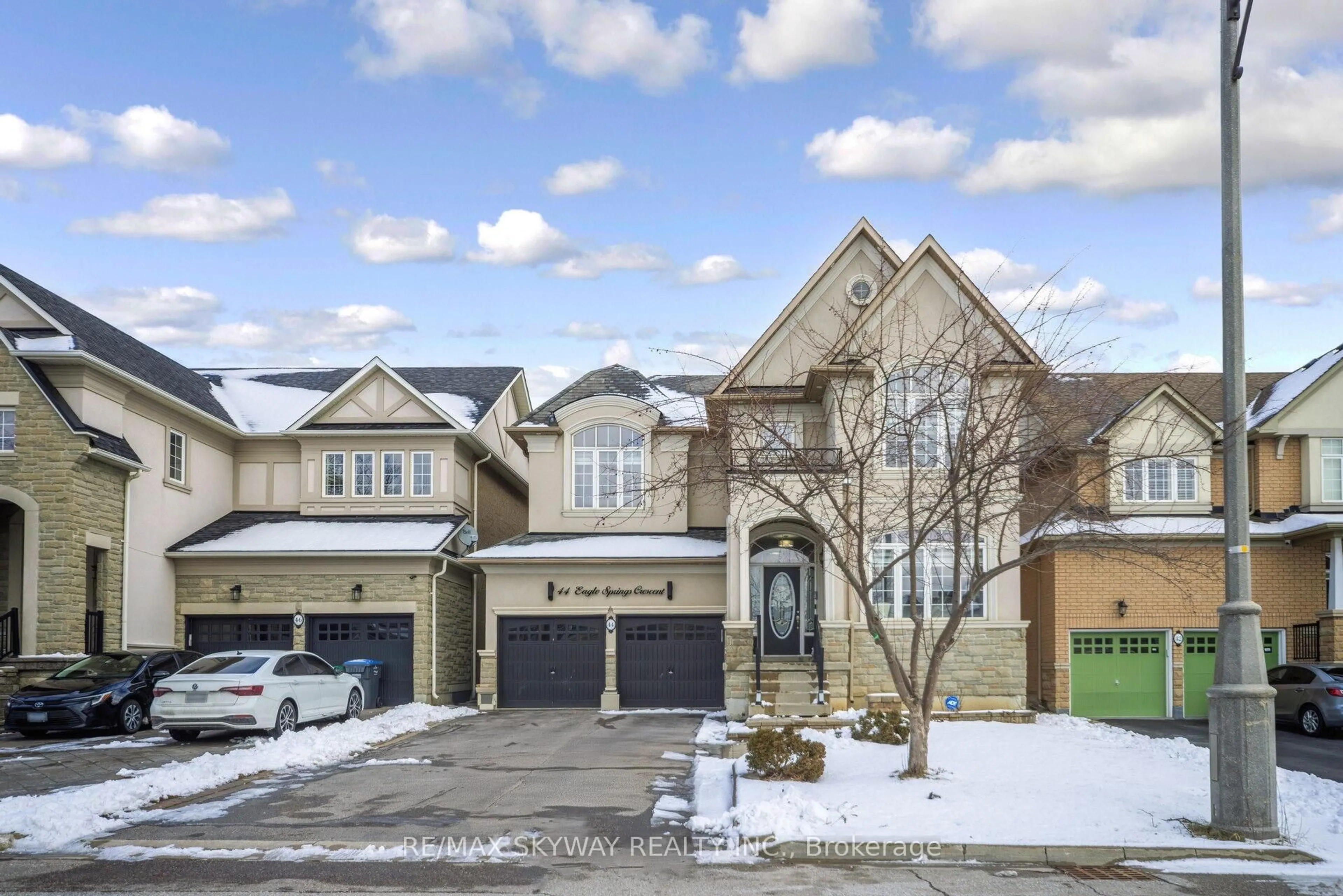 Home with brick exterior material, street for 44 Eaglesprings Cres, Brampton Ontario L6P 2W2