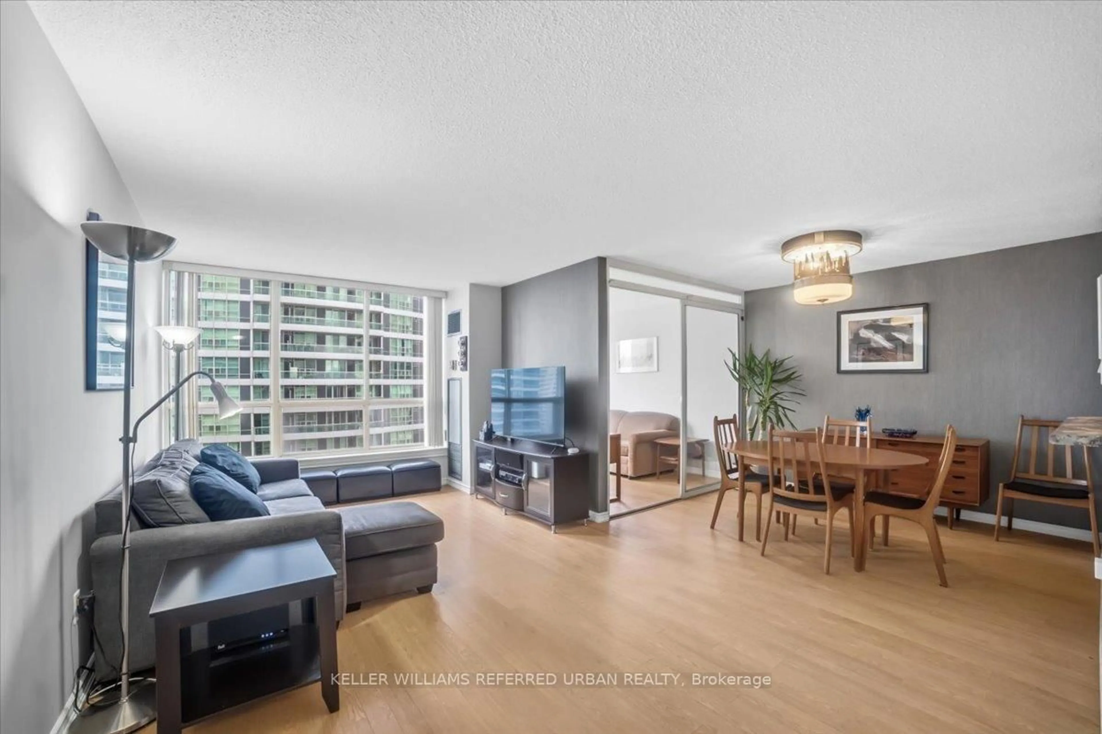 Living room with furniture, unknown for 55 Elm Dr #910, Mississauga Ontario L5B 3Z3