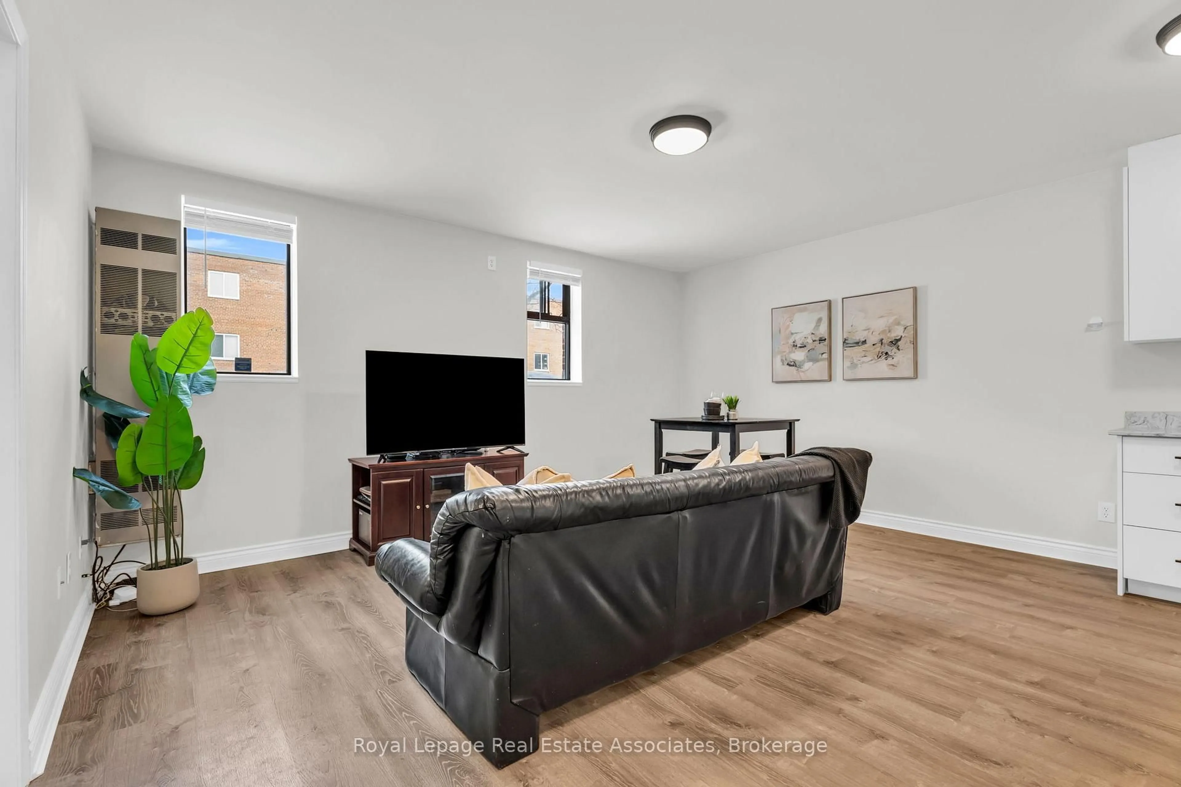 Living room with furniture, unknown for 70 First St #102, Orangeville Ontario L9W 2E5