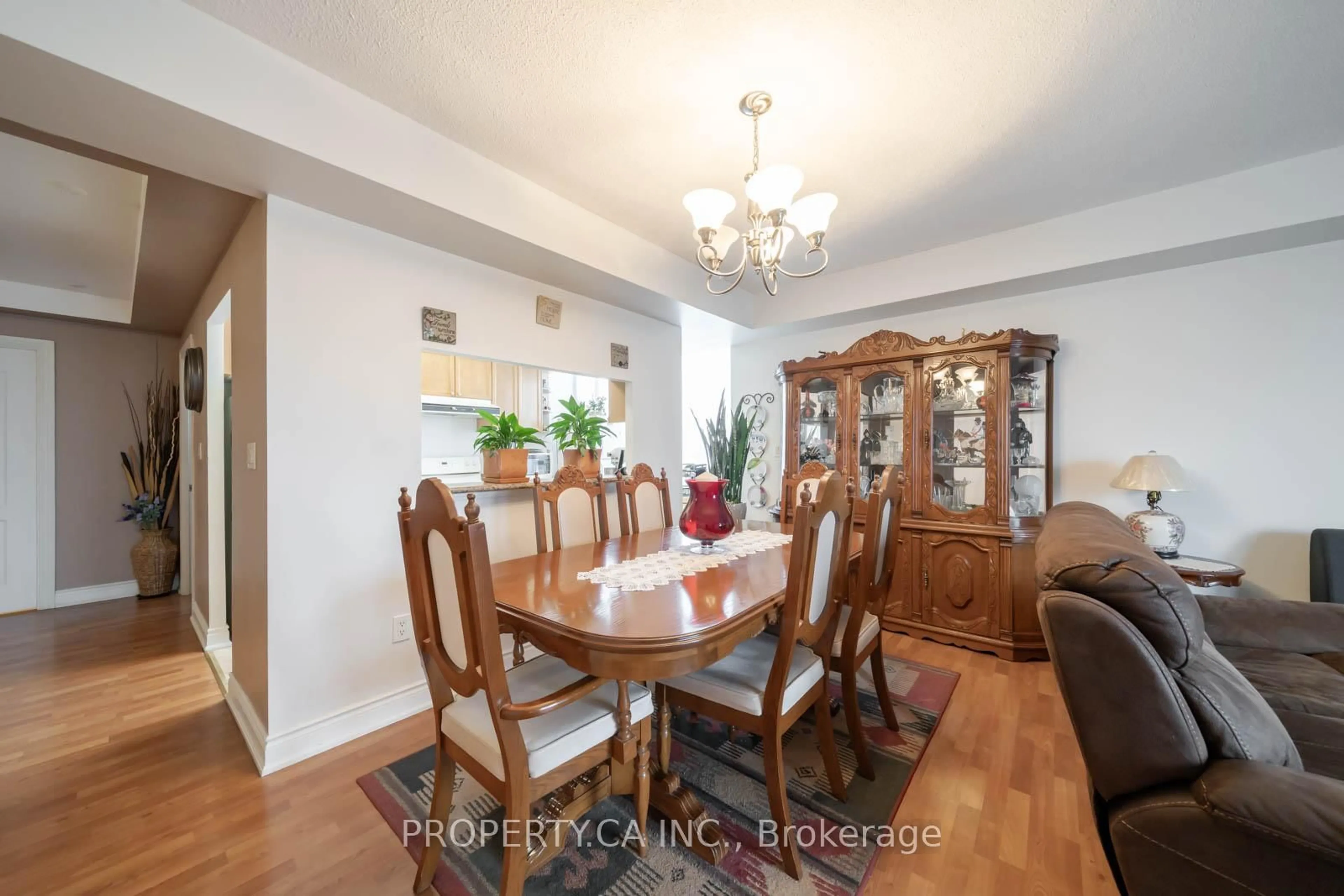 Dining room, wood/laminate floor for 2088 Lawrence Ave #609, Toronto Ontario M9N 3Z9