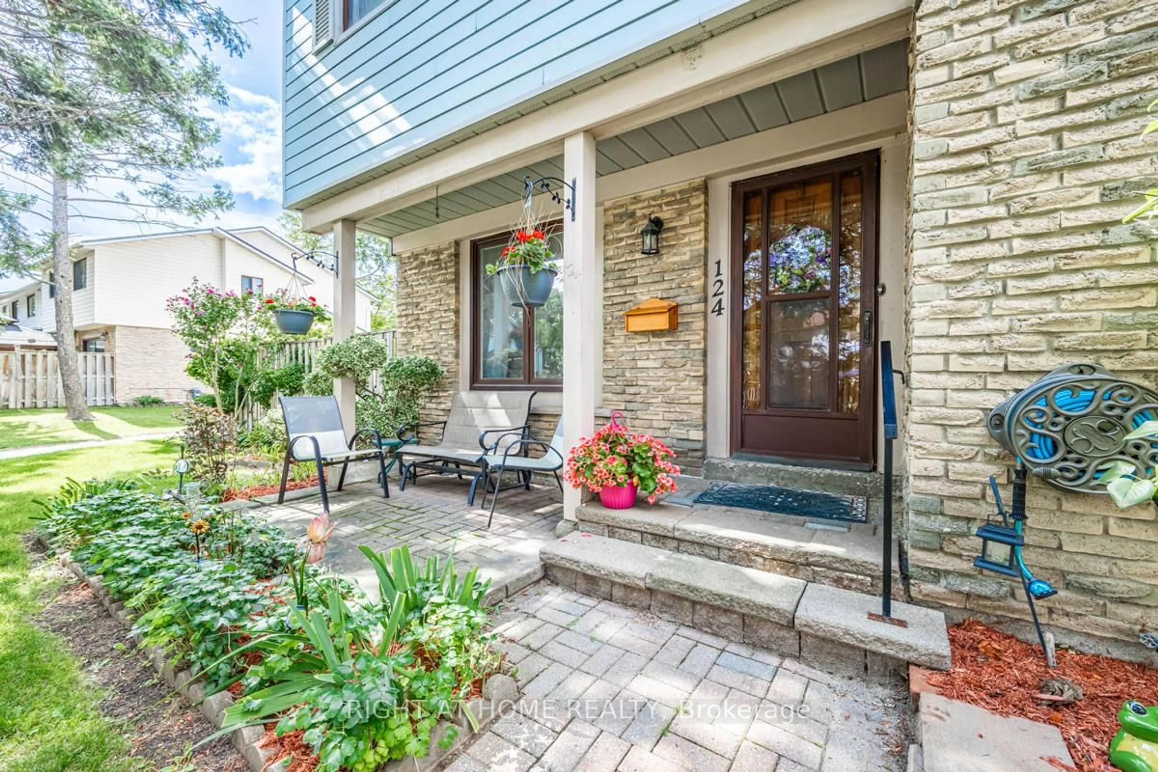 Home with brick exterior material, street for 6540 Falconer Dr #124, Mississauga Ontario L5N 1M1