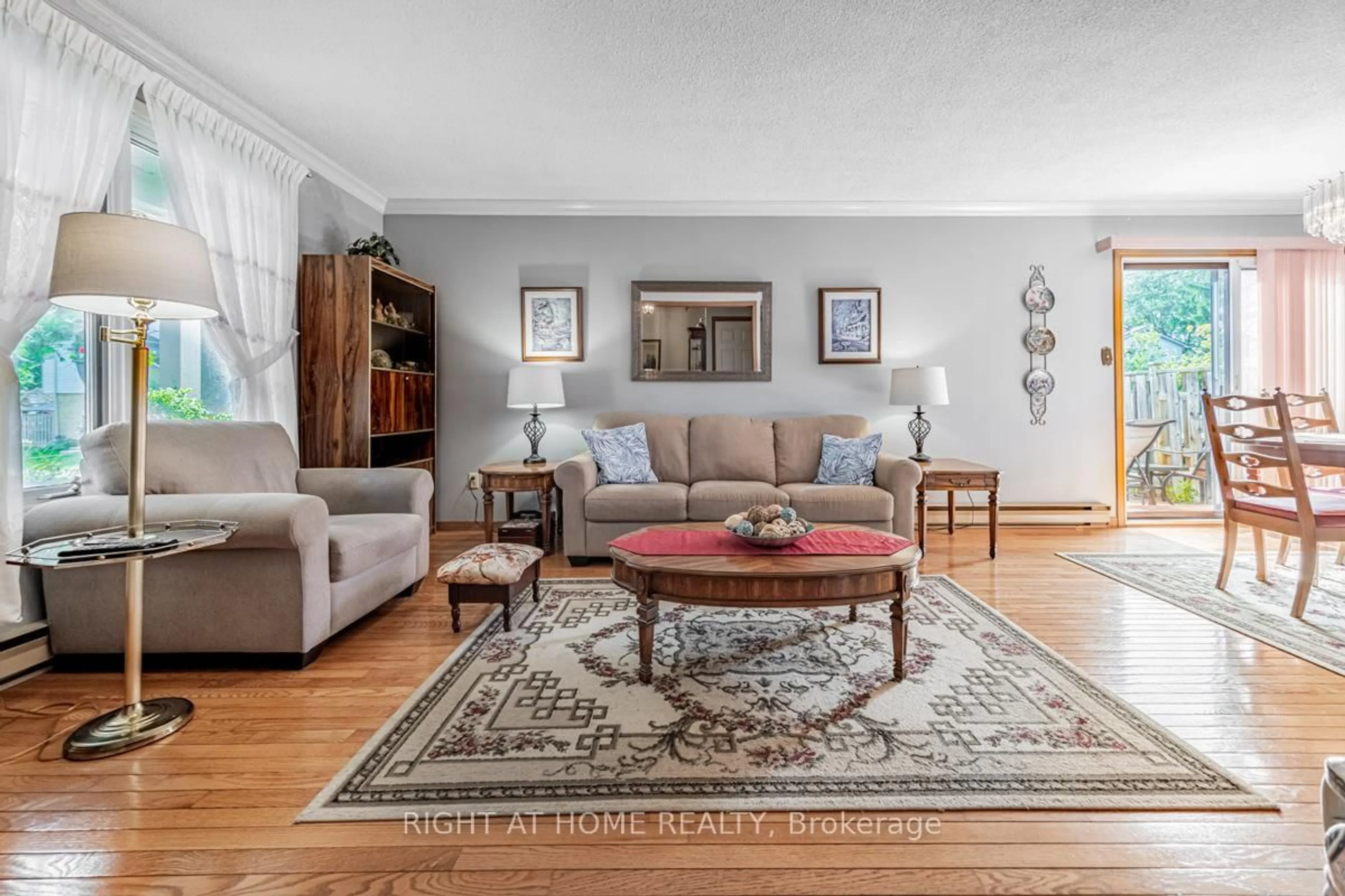 Living room with furniture, unknown for 6540 Falconer Dr #124, Mississauga Ontario L5N 1M1