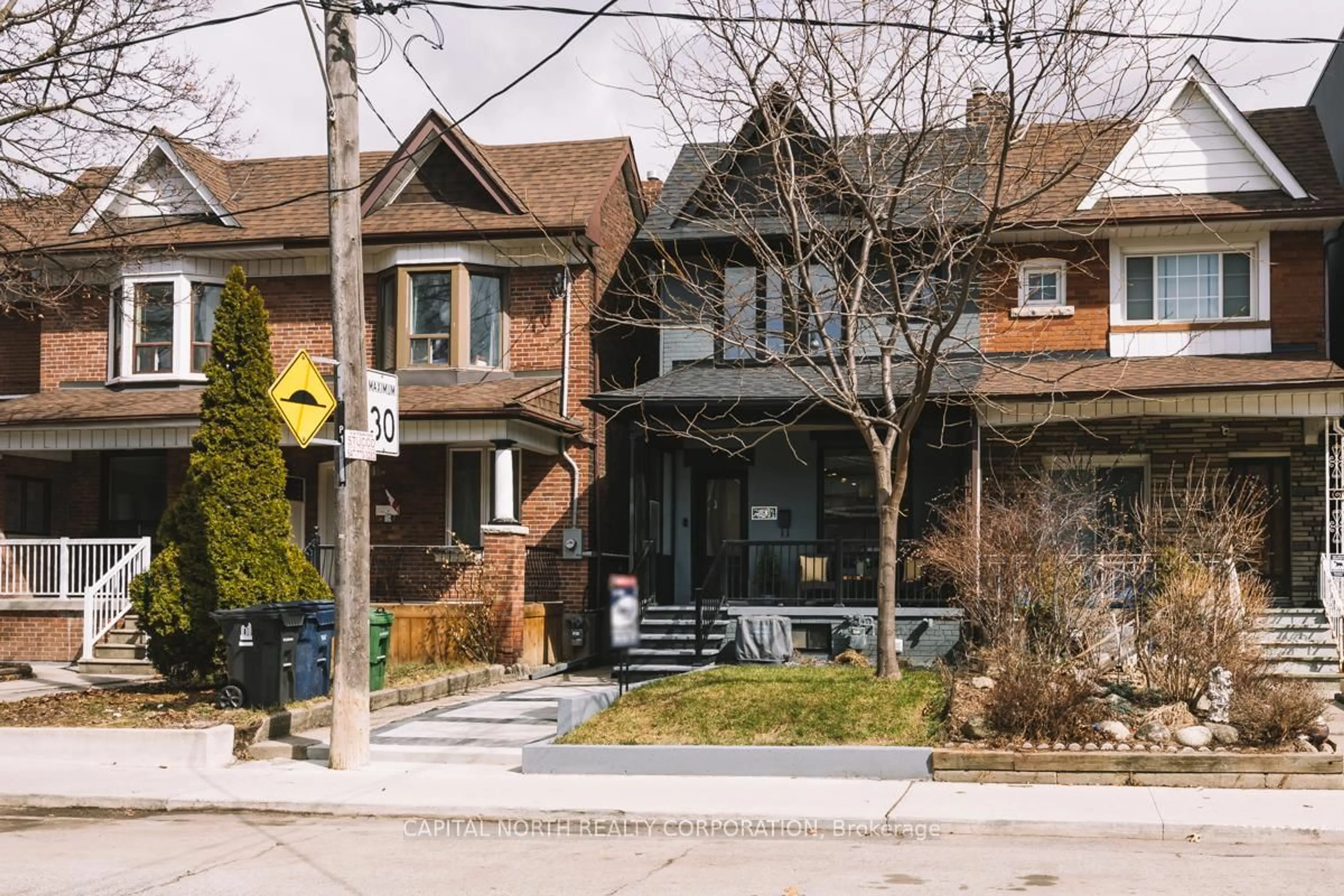 Home with brick exterior material, street for 183 Laughton Ave, Toronto Ontario M6N 2X6