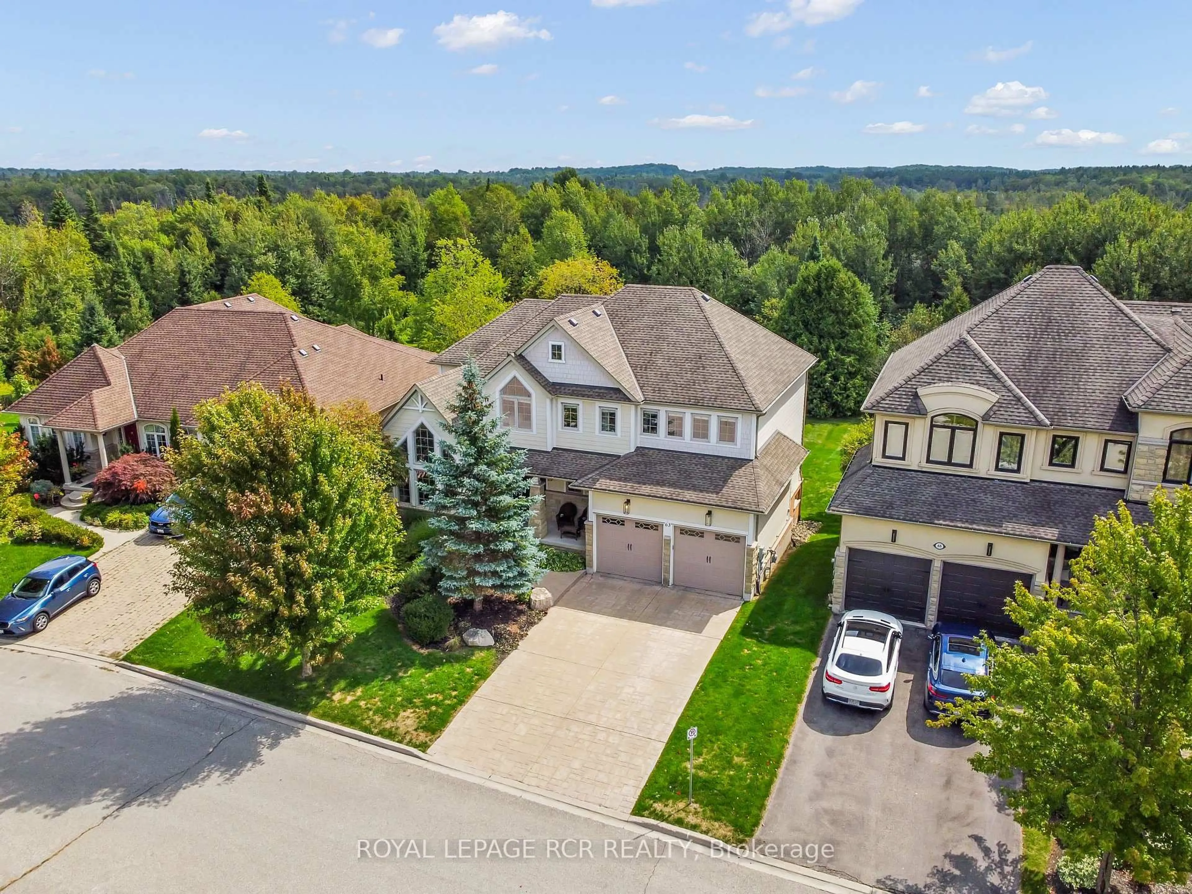 A pic from outside/outdoor area/front of a property/back of a property/a pic from drone, unknown for 63 Young Crt, Orangeville Ontario L9W 0A8