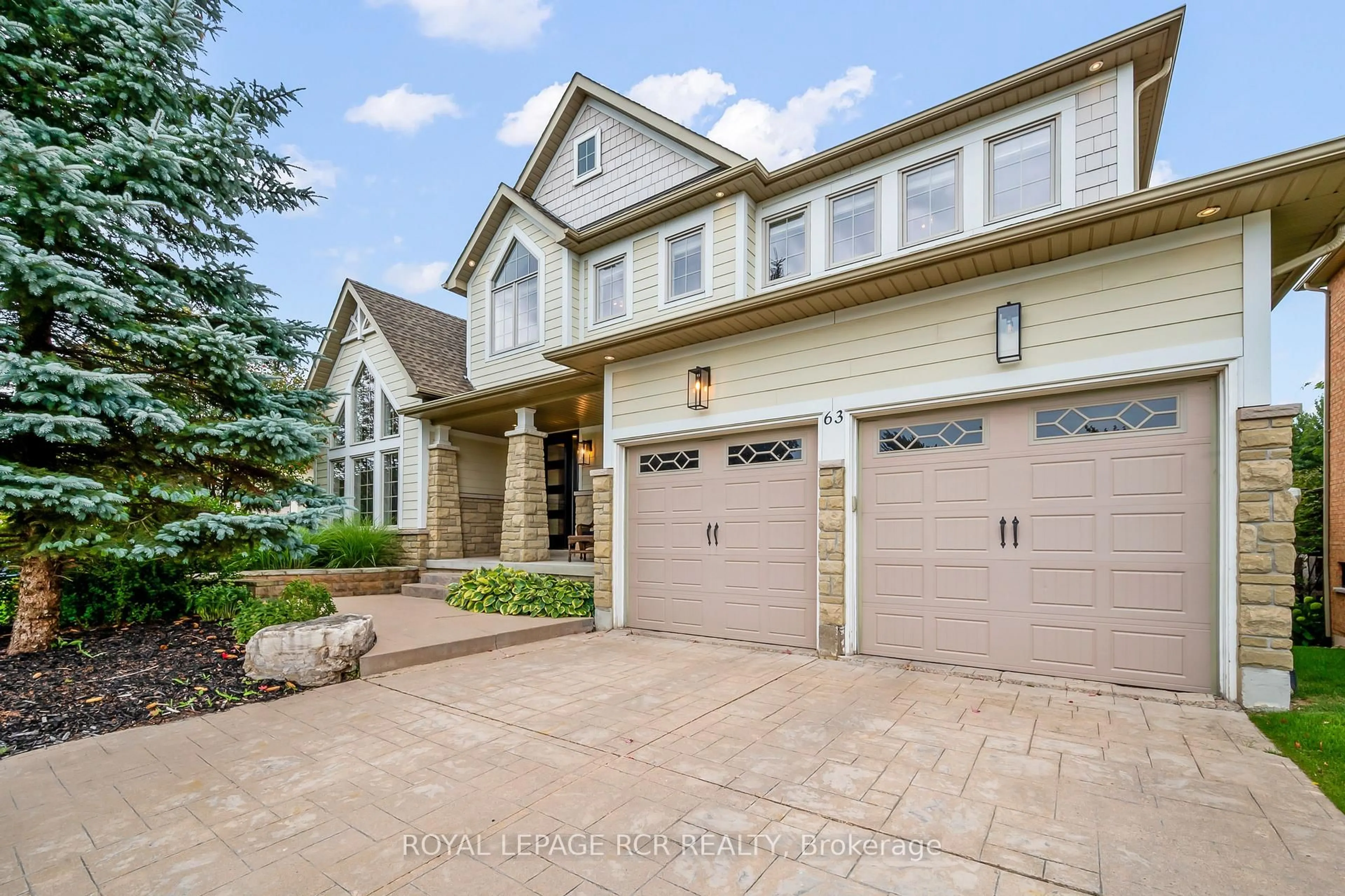 Home with brick exterior material, street for 63 Young Crt, Orangeville Ontario L9W 0A8