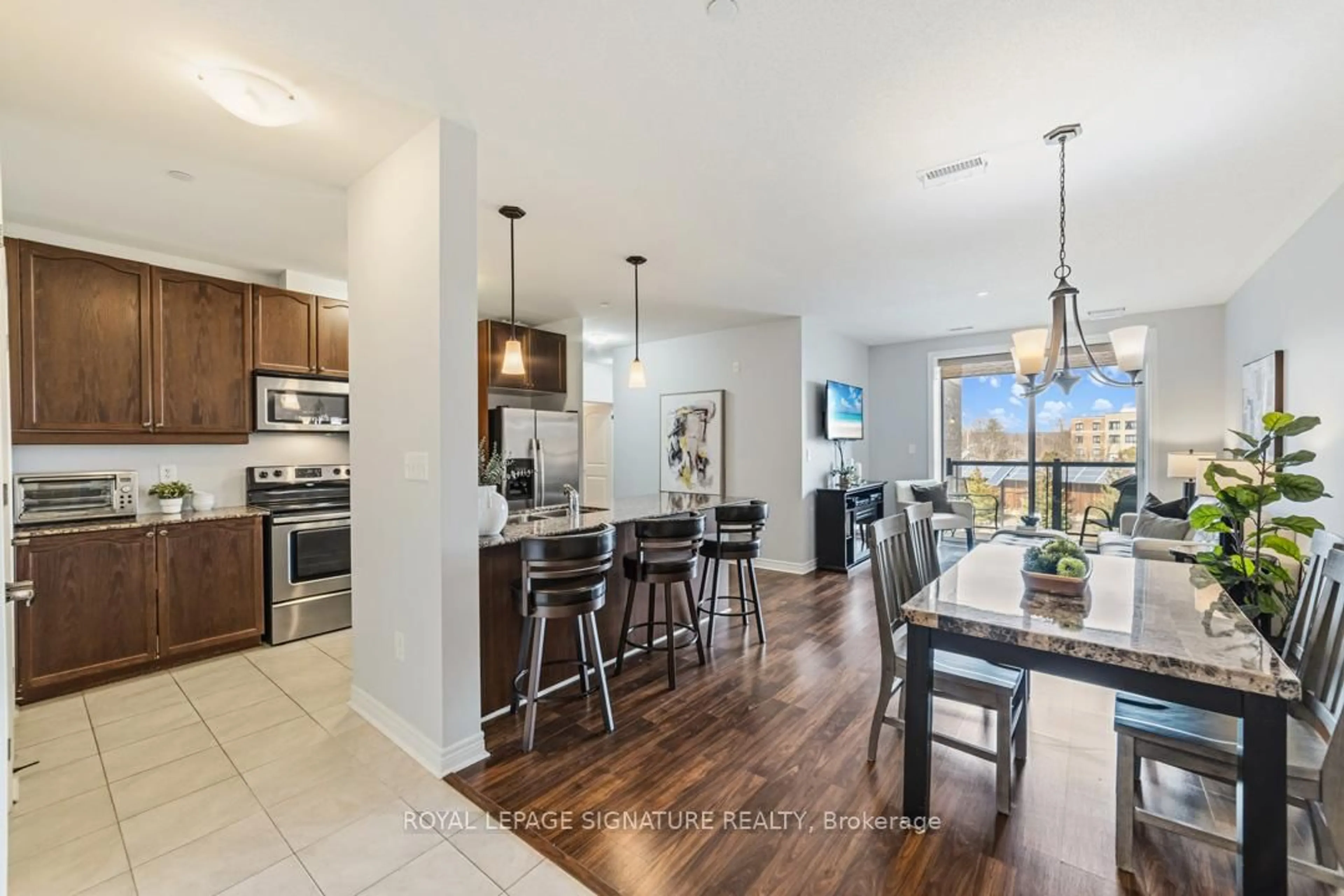 Open concept kitchen, ceramic/tile floor for 383 Main St #319, Milton Ontario L9T 8K8