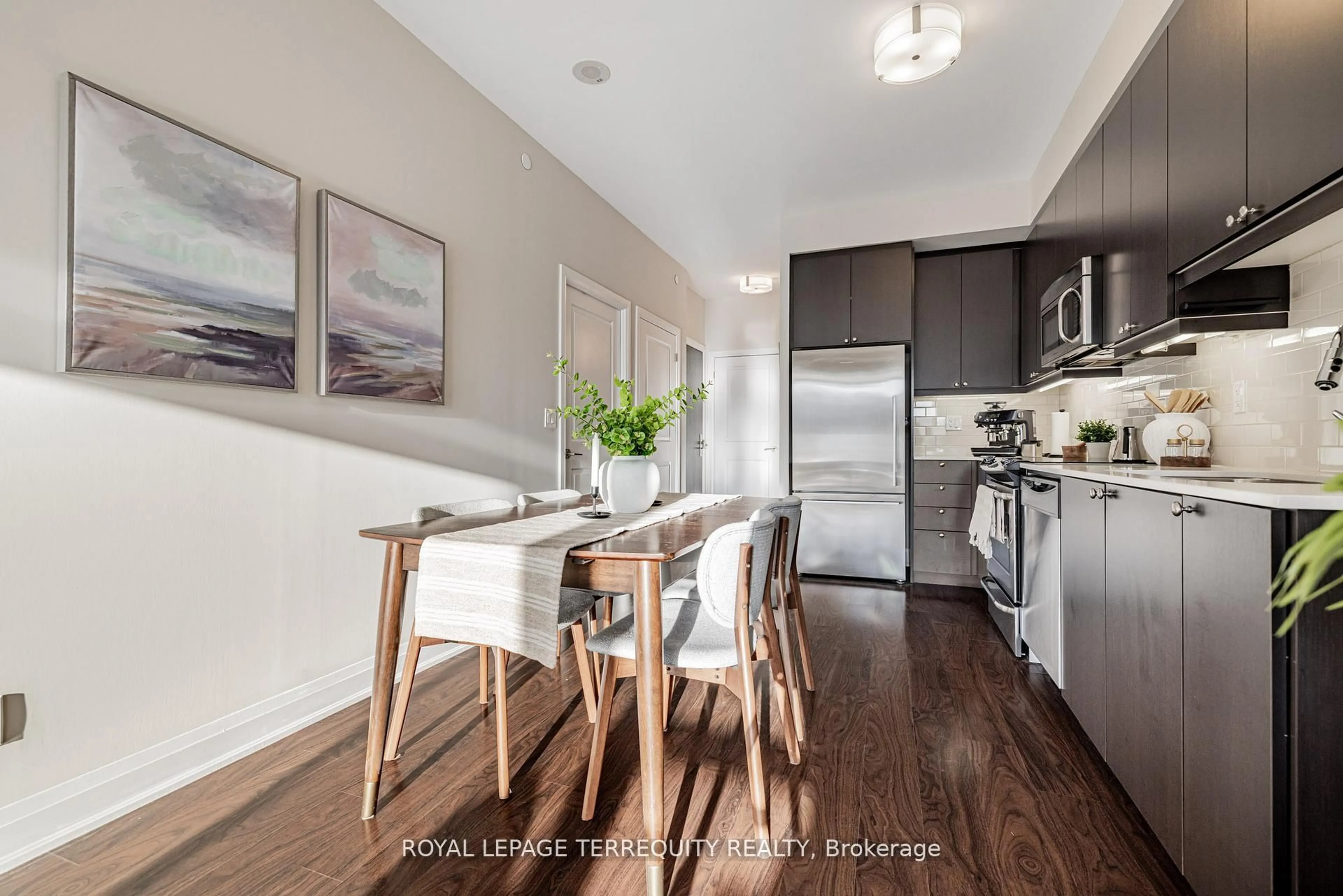 Open concept kitchen, wood/laminate floor for 35 Fontenay Crt #401, Toronto Ontario M9A 0E2