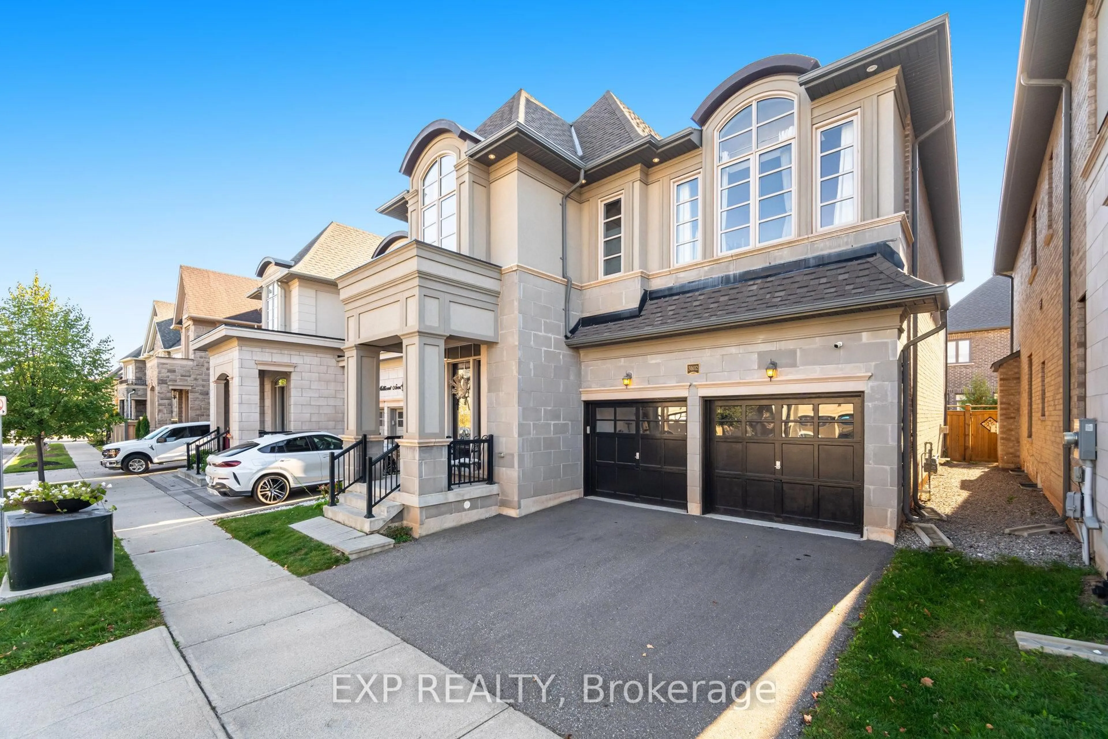 Home with brick exterior material, street for 3102 Millicent Ave, Oakville Ontario L6H 0V2